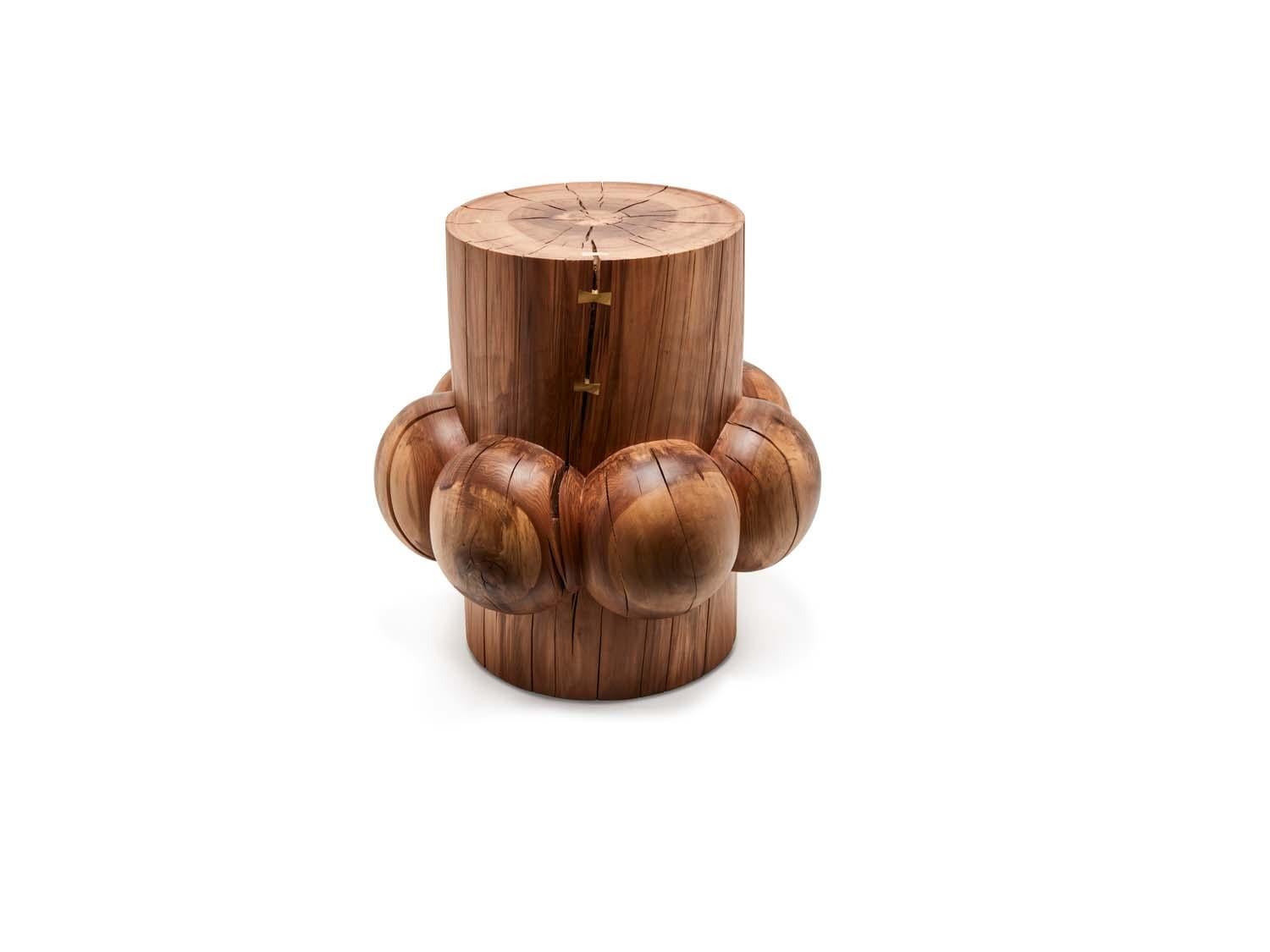 This one of a kind Bollard table in sold gum wood is by woodworking artist Wyatt Speight Rhue. One of a trio, each a variation on the form. 

