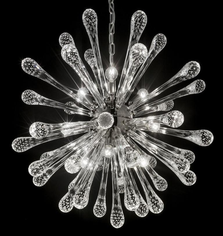 Italian modern Sputnik chandelier shown in clear drop shaped Murano glass hand blown with bubbles inside the glass using Bollicine technique, mounted on chrome frame / designed by Fabio Bergomi for Fabio Ltd, made in Italy
9 lights / E12 or E14 type