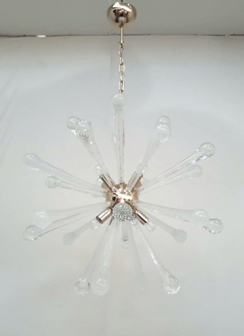 Italian modern sputnik chandelier shown in mixture of vintage clear and frosted Murano glass drops hand blown with bubbles inside the glass using Bollicine technique, mounted on newly made gold finish metal frame / Made in Italy
8 lights / E12 or