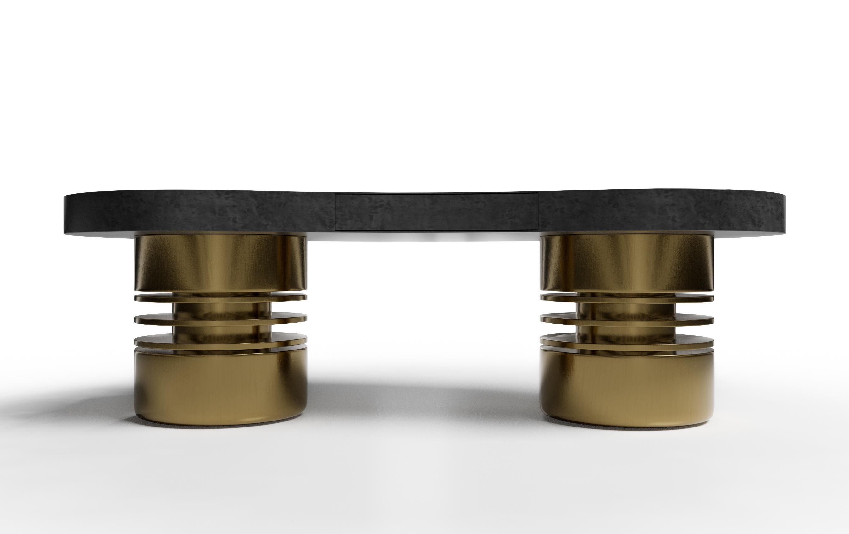 The Bolsa desk sends a strong statement of form and function. With unique cylindrical bases and a luxurious desktop, the Bolsa desk will be the jewel of any room. The Bolsa desk is offered in a variety of woods and finishes and is shown in opulent