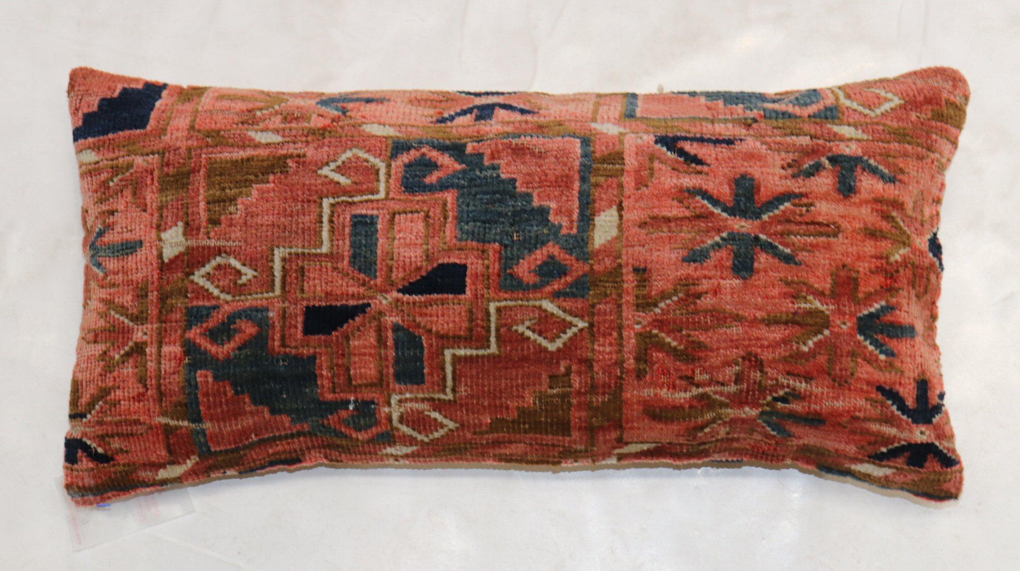 Pillow made from a 19th-century Turkeman rug in a bolster size.

Measures: 12