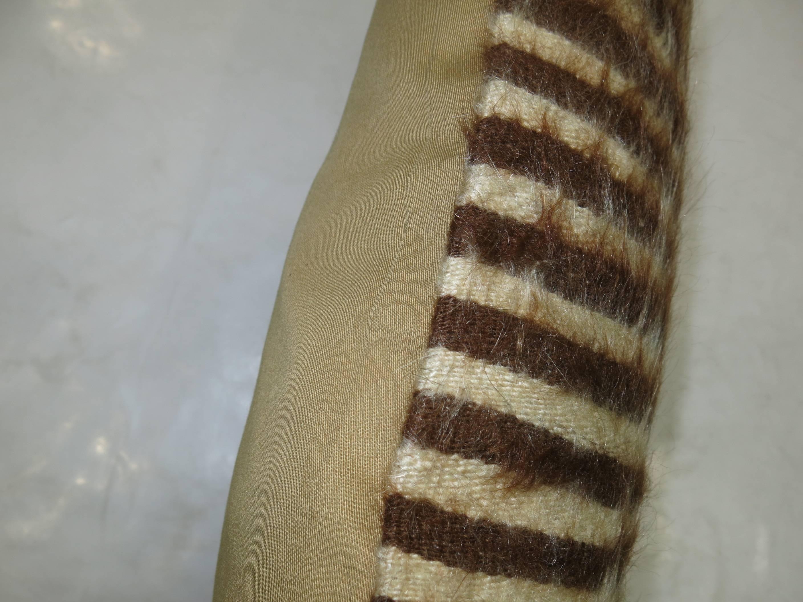 A bolster size pillow made from a Turkish Mohair rug.

12'' x 22''

