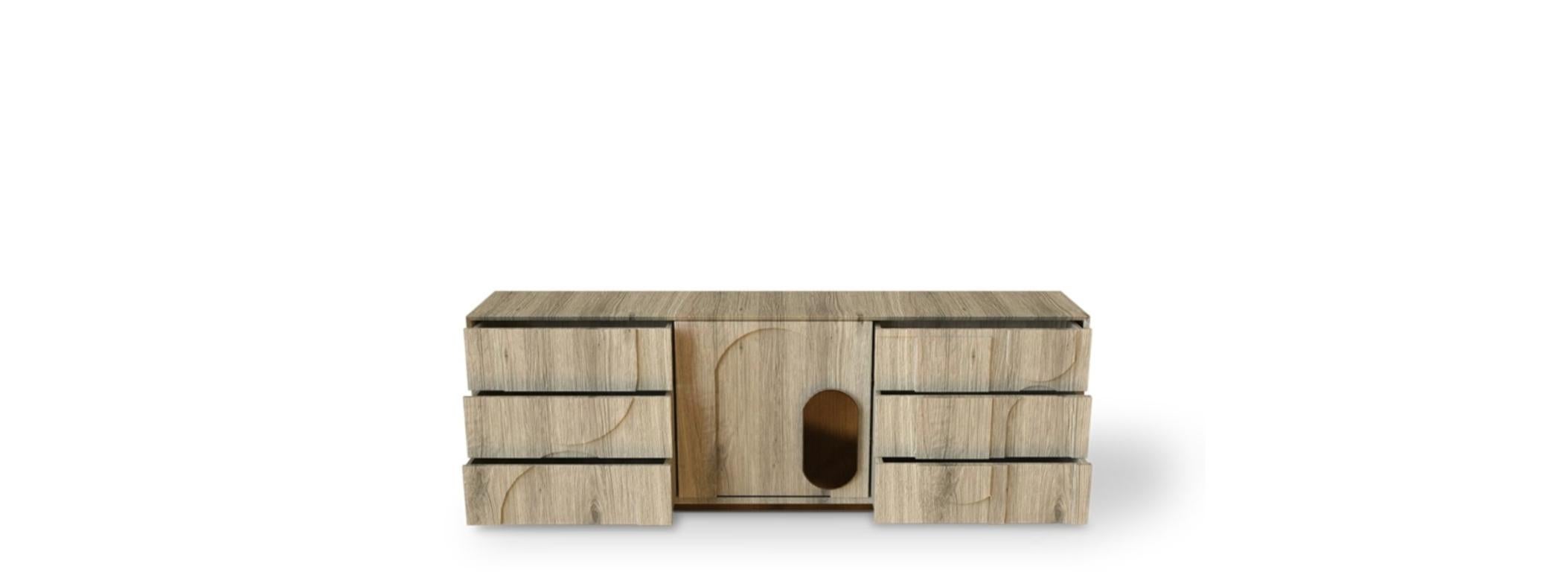 Modern Boma Decape Oak Veneer Sideboard by Caffe Latte

Modern Boma Decape Oak Veneer Sideboard by Caffe Latte a breathtaking casegood where the round inox aged detail protrudes from the organic pattern of the decape wood. The use of this specific