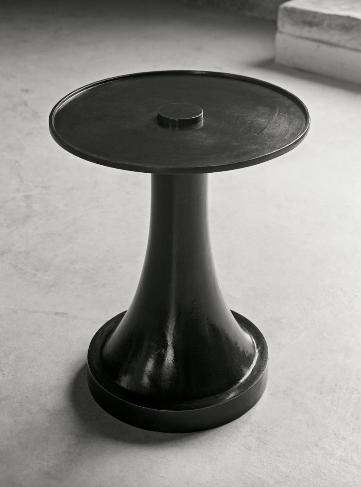 This piece is cast Bronze, finished with a hand-applied patina and tinted wax. The finish is meant to age and patina with use.