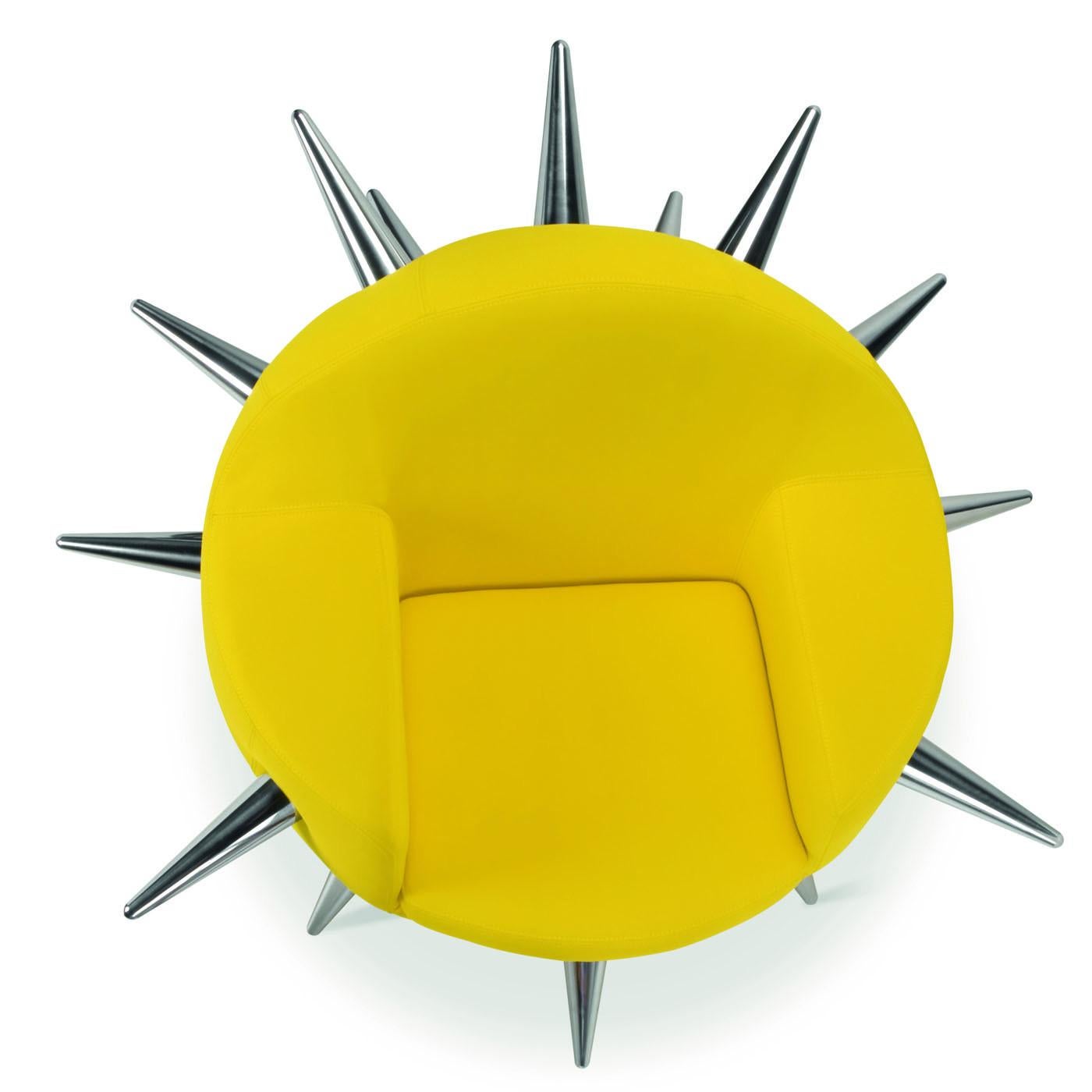 Designed by Simone Micheli, Bomb is inspired by an object of destruction to invite to reflect on the drama of war and the hope that life will always prevail. The armchair is a designer piece, featuring rounded shape with tips in polished aluminum.