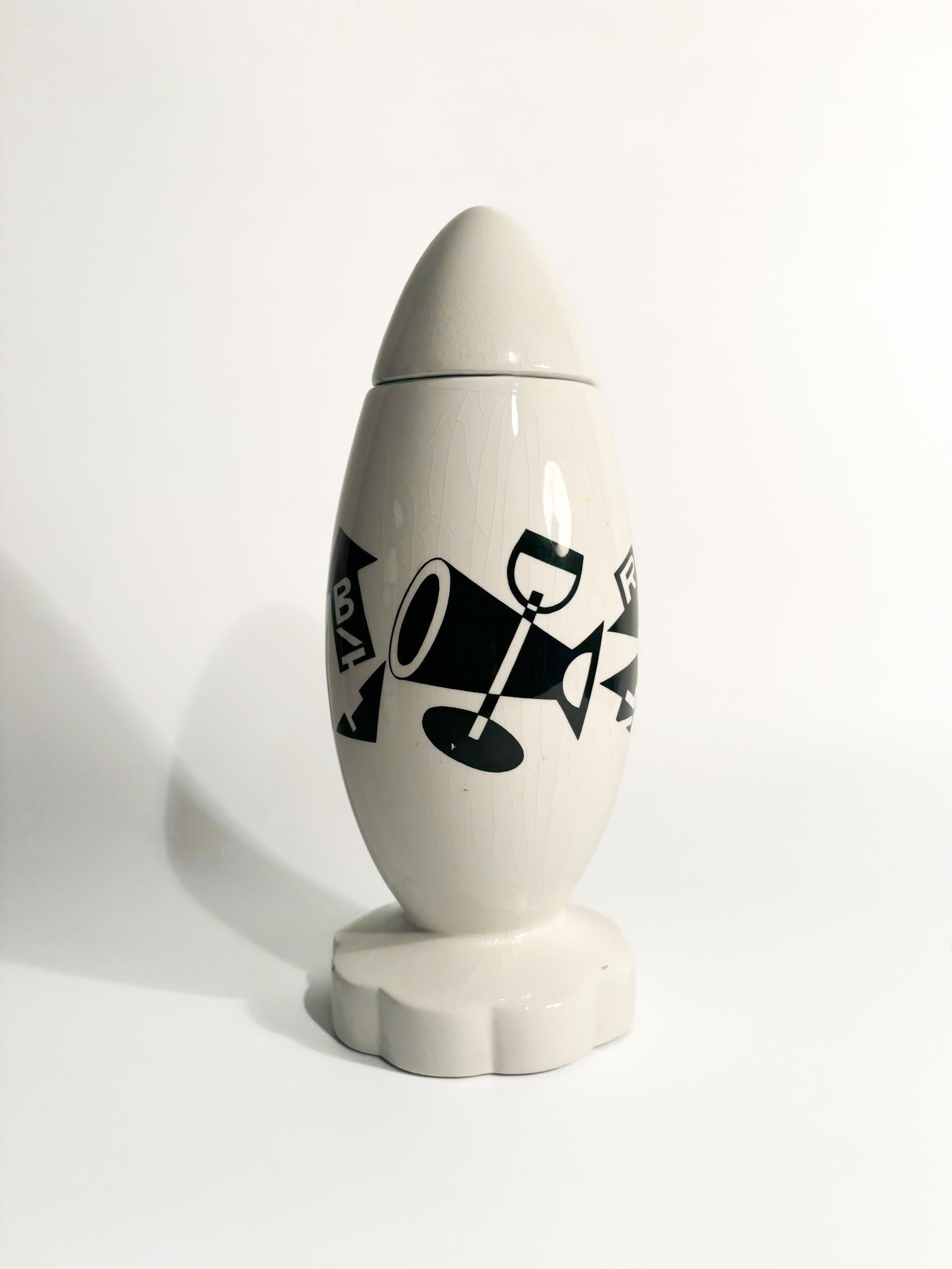 Campari torpedo vasemade by Matteo Thun inspired by Fortunato Depero in 1987. Minor scratches are present on the vase, due to time. 

Ø cm 10 h cm 25

Matteo Thun is a prominent Italian architect and designer known for his minimalist and functional