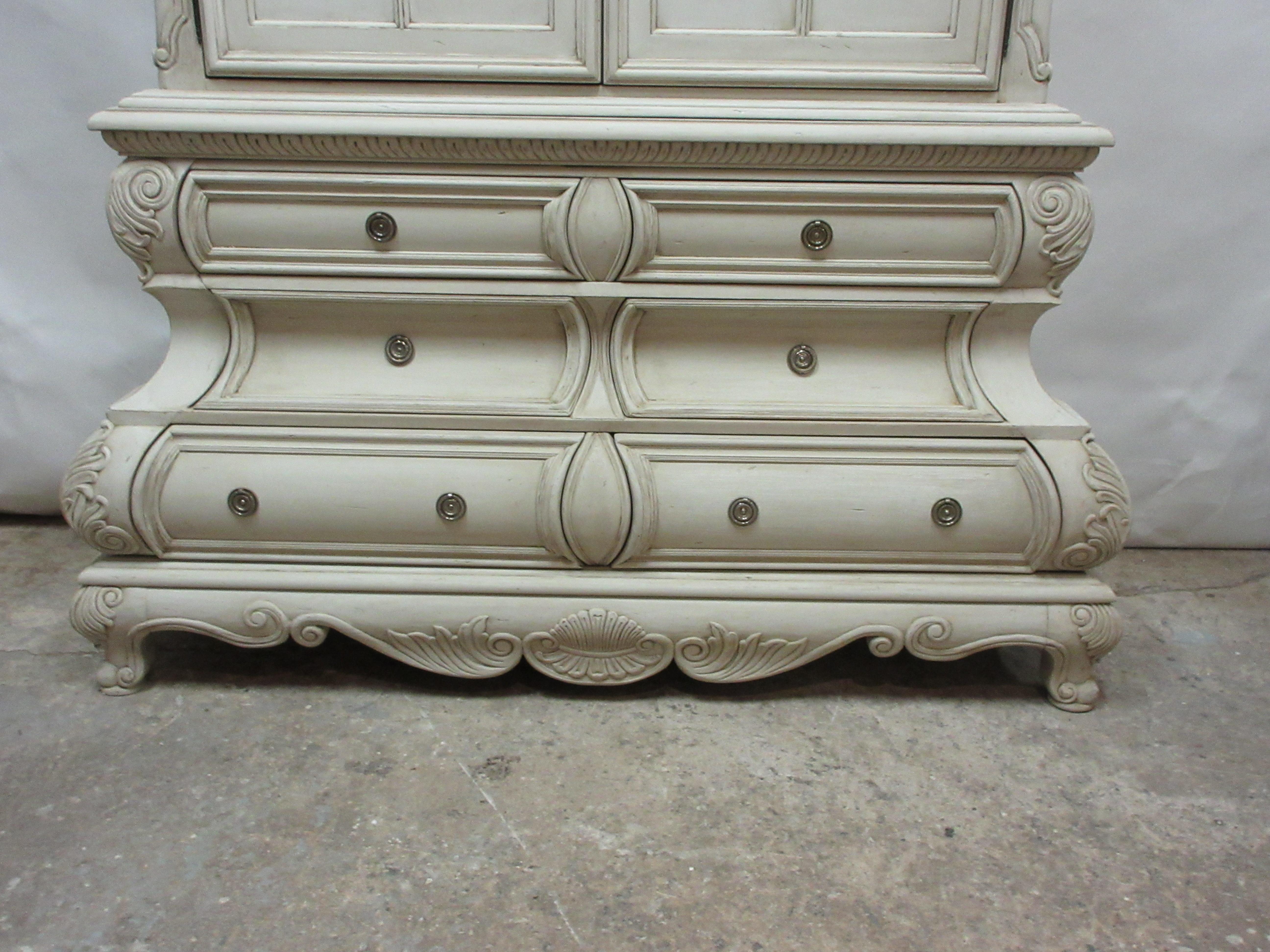This is a very large Bombay armoire, its been fully restored and repainted with milk paints 