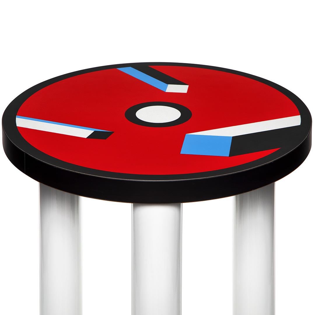 The Bombay side table has a beautiful contrasting laminate pattern top, designed in 1986 by Nathalie du Pasquier. 

Nathalie du Pasquier was born in Bordeaux, France, in 1957.She has lived and worked in Milano since 1979. Until 1986 she worked as a