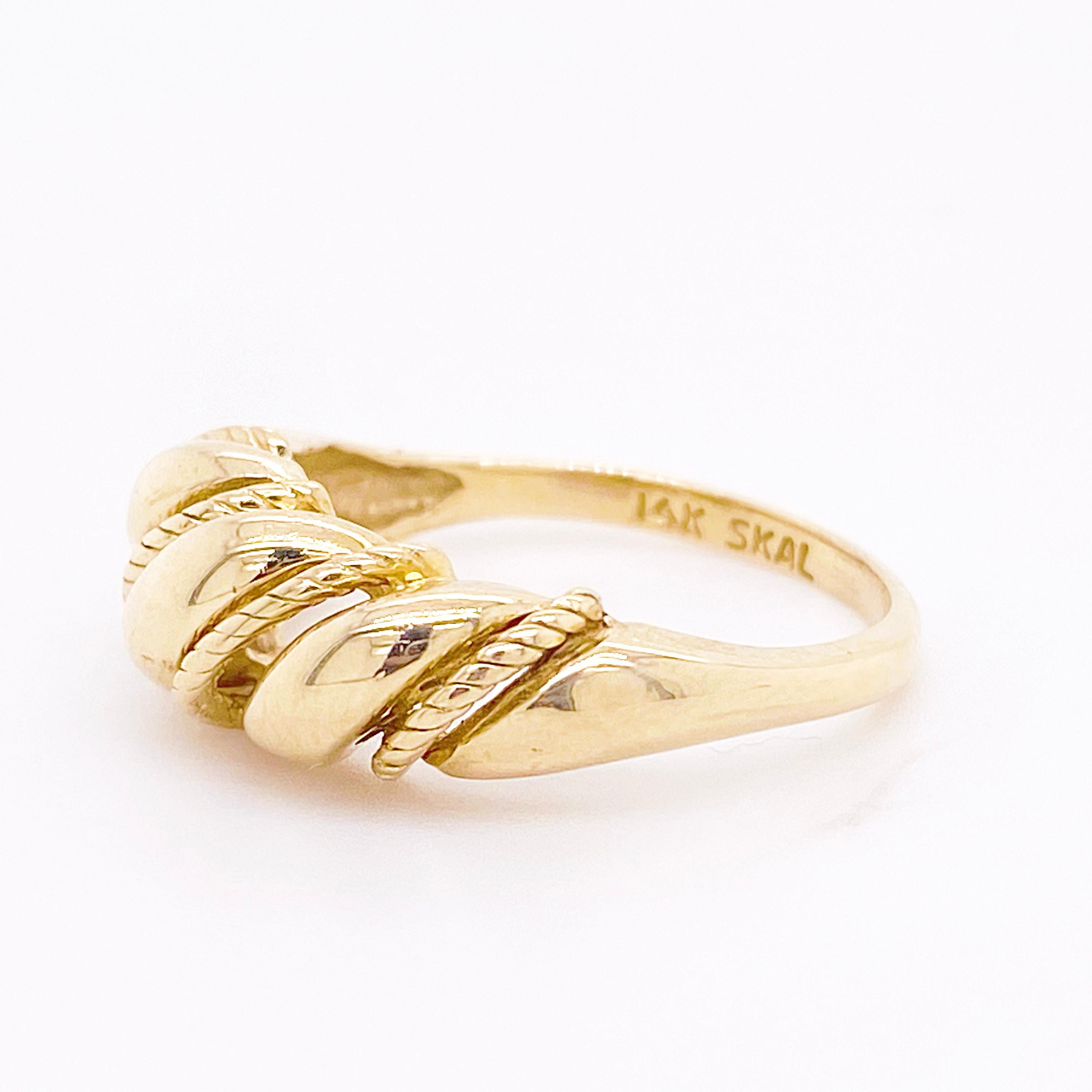 This dome ring in 14 karat solid yellow gold is one of the most basic of a jewelry wardrobe. It can be worn on any finger and looks great paired with almost any other ring. The details for this beautiful ring are listed below:
Metal Quality: 14