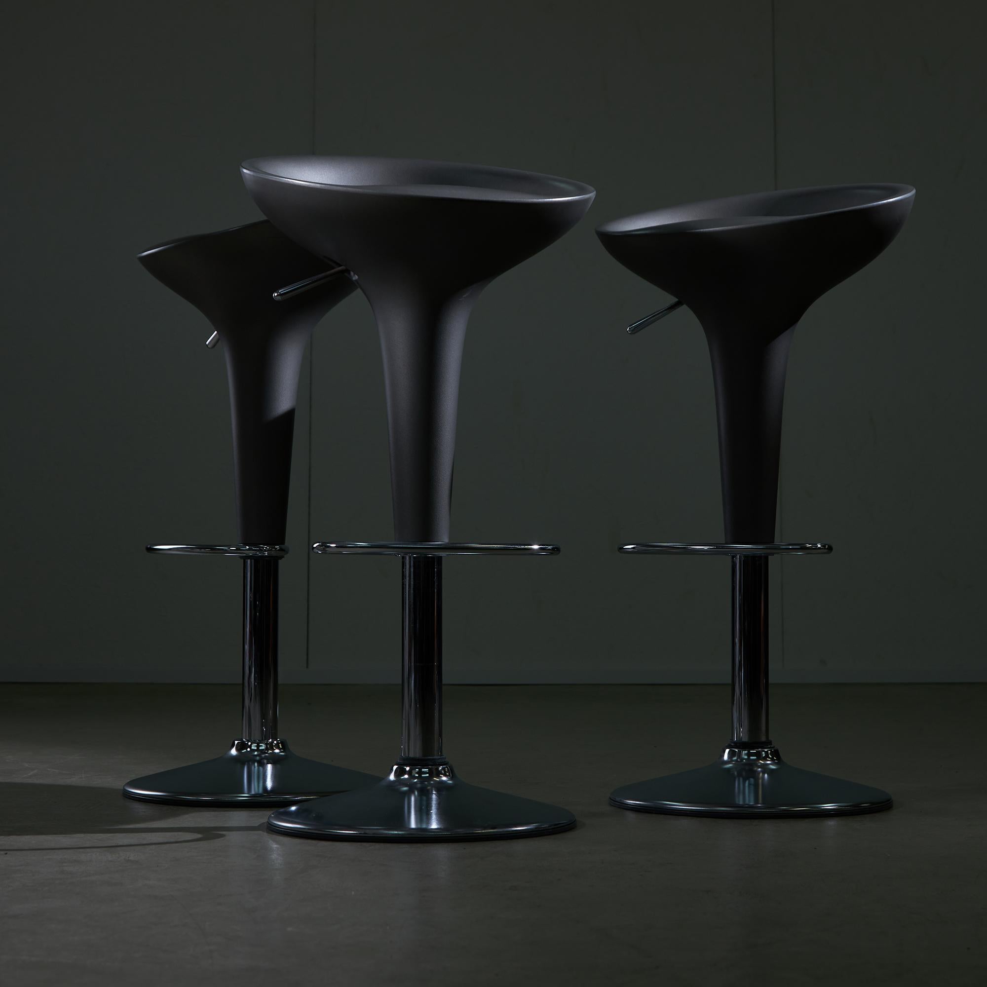 The Bombo Chair, designed by Stefano Giovannoni in the late 1990s, is a notable example of modern furniture design. It features a distinctive shape characterized by its round, bowl-like seat and a telescoping height adjustment mechanism, allowing it