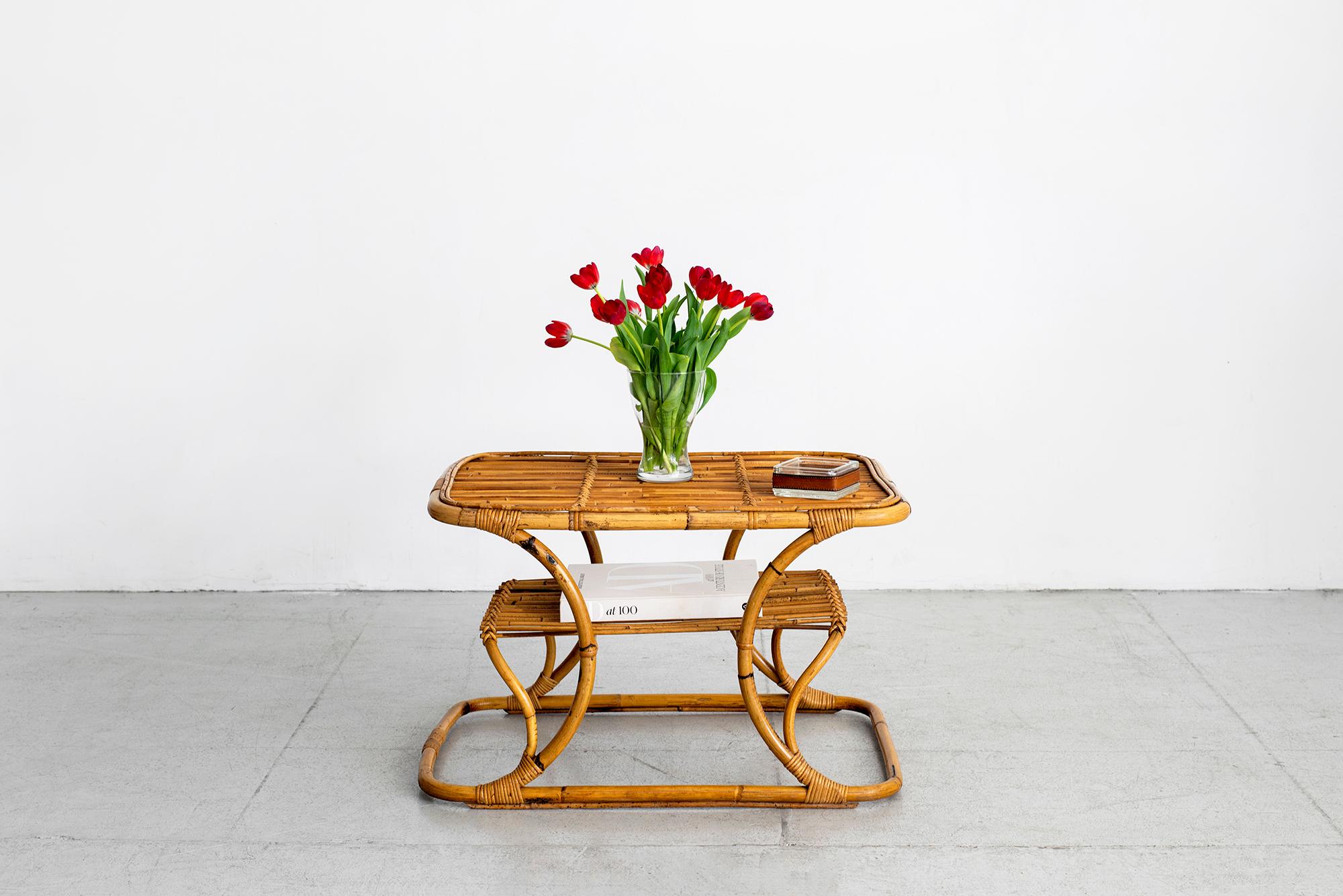 Italian coffee table with sculptural rattan and floating shelf.