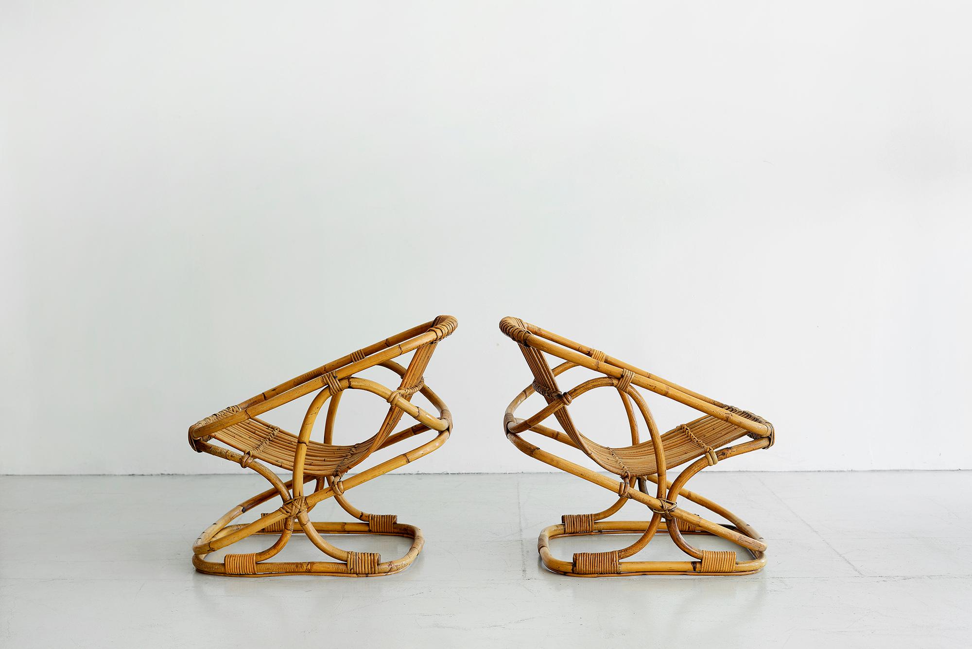 Italian rattan chairs by Bonacina with great sculptural shape.
