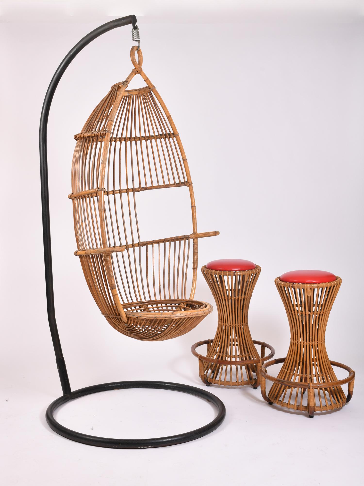 Bonacina rattan swing chair, circa 1960.

Incredibly comfortable and relaxing!! 

For indoor or outdoor use.
