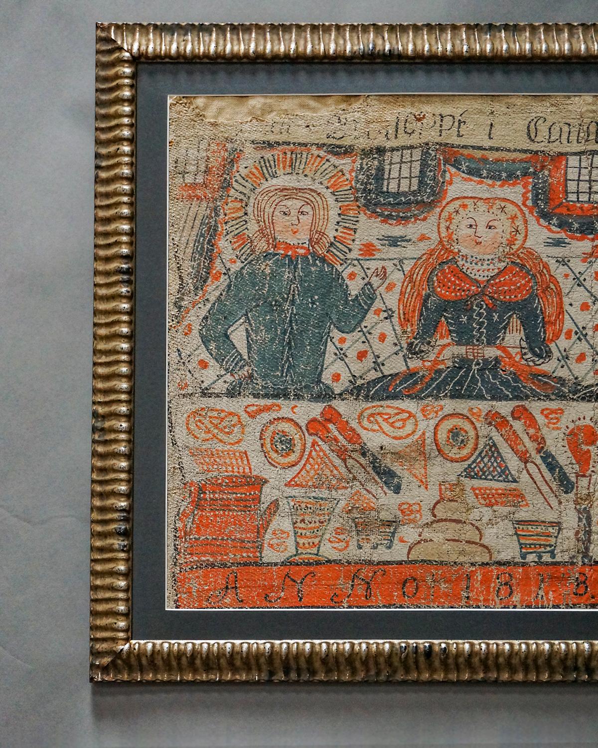 Swedish bonad fragment showing a scene from the story of the wedding at Cana. The bride is seated in the midst of her guests with Mary and Jesus to her right. On her left, her new husband and the minister lift a goblet of wine in a toast. Beyond