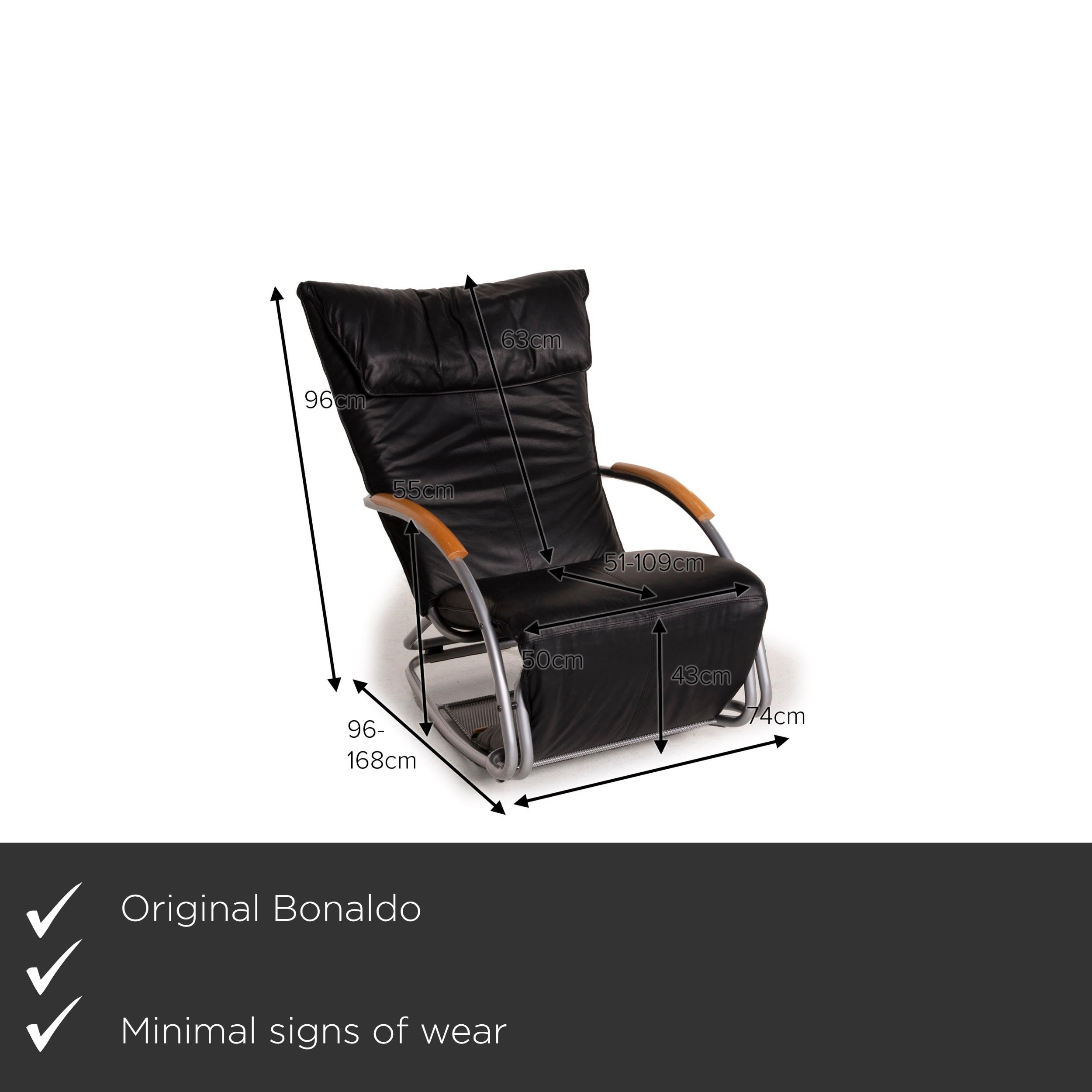 We present to you a Bonaldo swing leather armchair black rocking chair relaxation function lounger.


 Product measurements in centimeters:
 

Depth: 96
Width: 74
Height: 96
Seat height: 43
Rest height: 55
Seat depth: 51
Seat width: