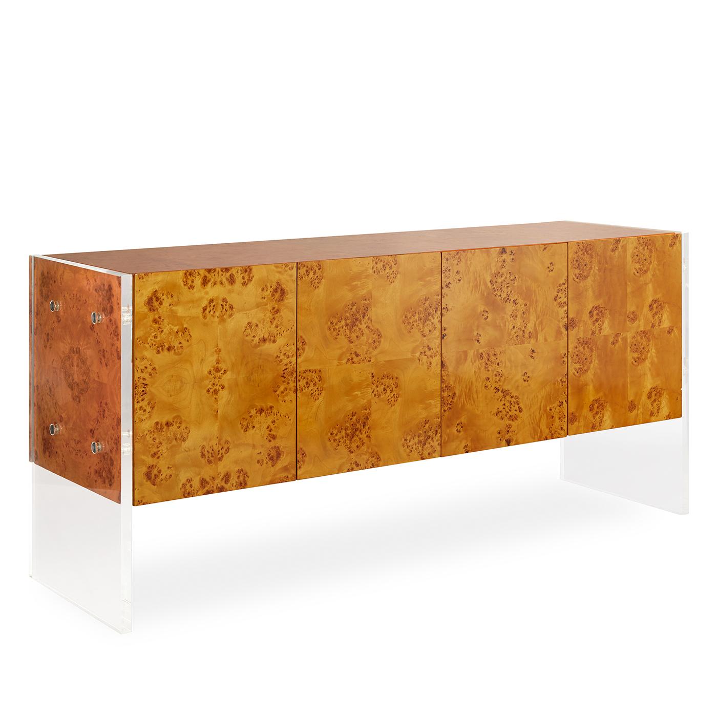 Timelessly Chic. Pieced, burled mappa between Lucite legs with stainless steel accents. Pieced veneer cabinet faces showcase naturally occurring patterns in the wood, and an adjustable shelf inside provides posh storage. With a fully finished back,
