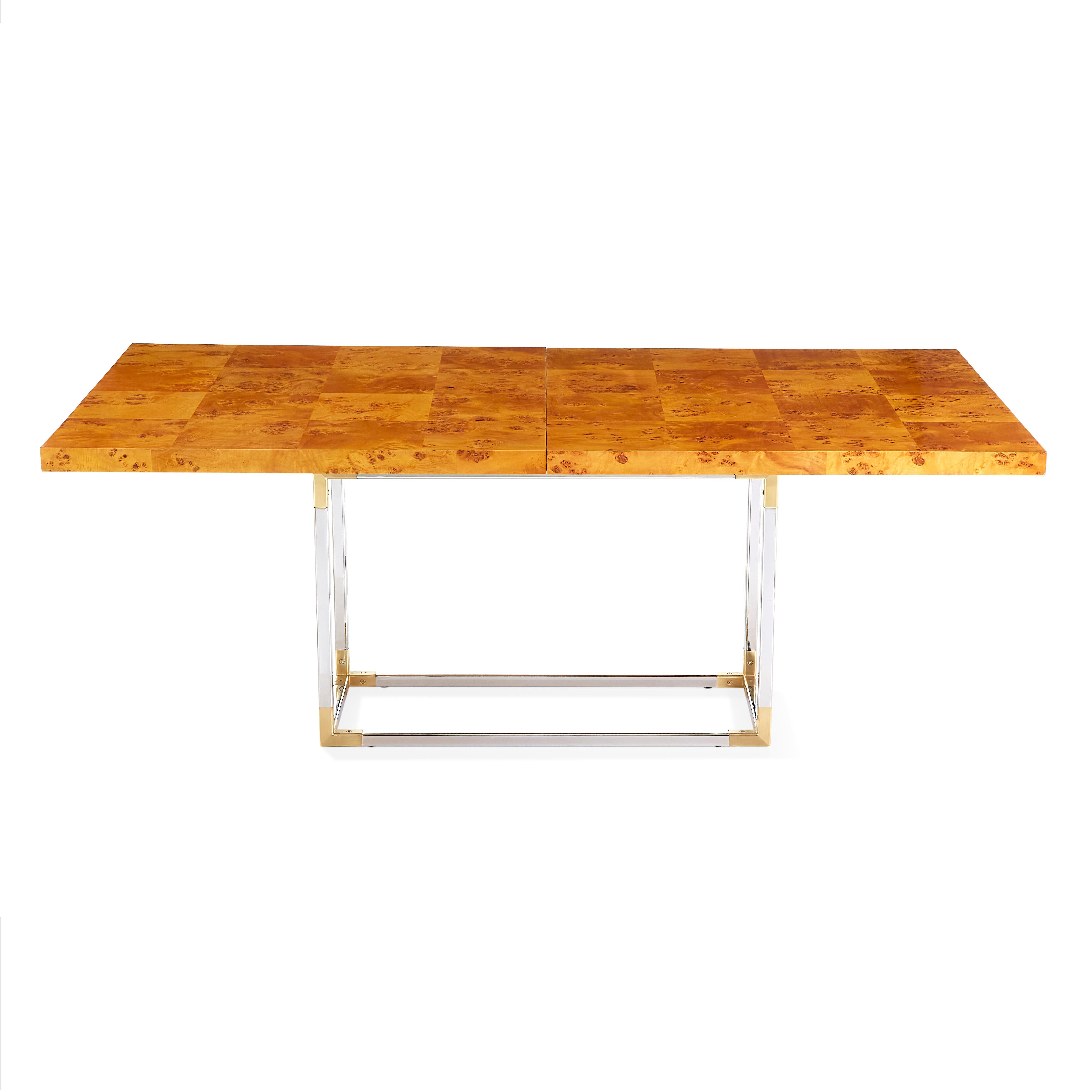 Timelessly chic. From our chic burled wood collection, a Minimalist dining table that feels organic, worldly, and wonderfully warm. Naturally honey-hued, pieced mappa wood is treated to a durable satin matte finish and set atop a polished nickel