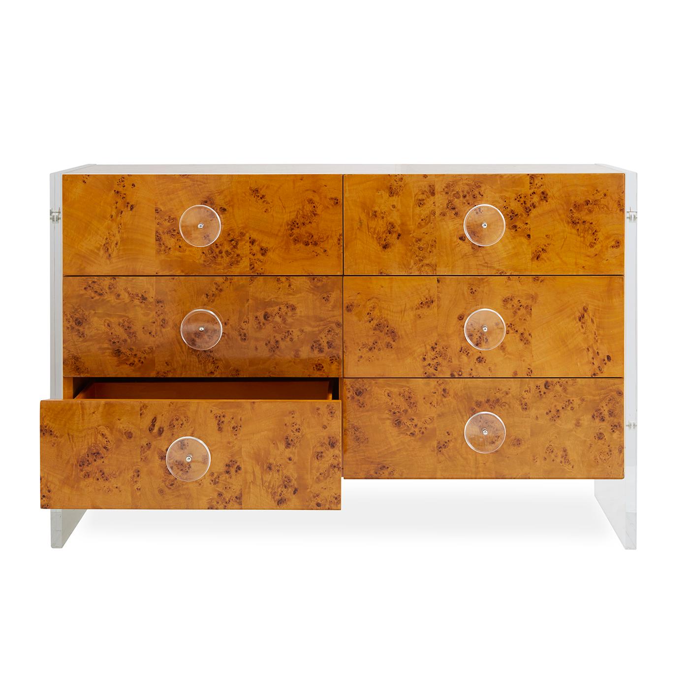 Timelessly Chic. From our chic burled wood collection—warm mappa wood floats between acrylic legs with stainless steel accents. Six generous drawers showcase naturally occurring patterns in the wood, while oversized acrylic pulls and soft-close