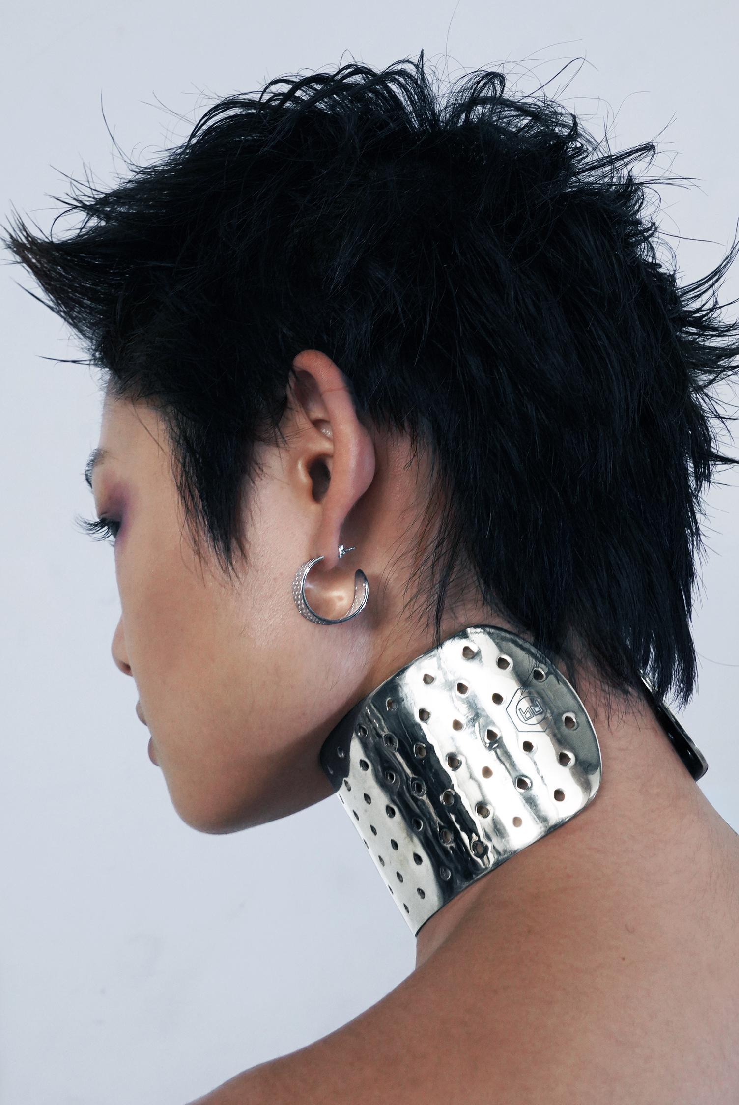 Perforated metal open-back earrings with butterfly clasp closures and a high-polish finish. Wear individually, as a pair, or mix + match with a Perforated Cuff Earring. Made by BOND HARDWARE.

BOND Hardware is a sustainable jewelry and accessories