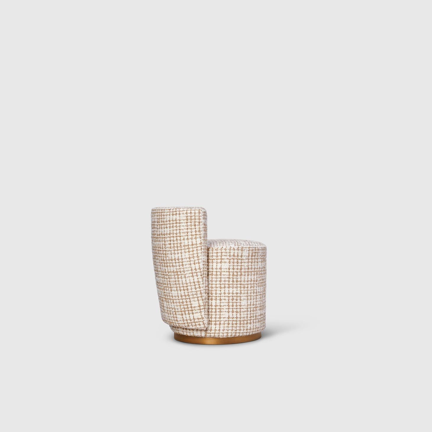 This in-stock Bond Street stool by Yabu Pushelberg is presented in Dedar More-is-More fabric on it's swiveling antique brass finish base. The stool has an architectural form and can also be ordered in your choice of fabric or leather.

A version