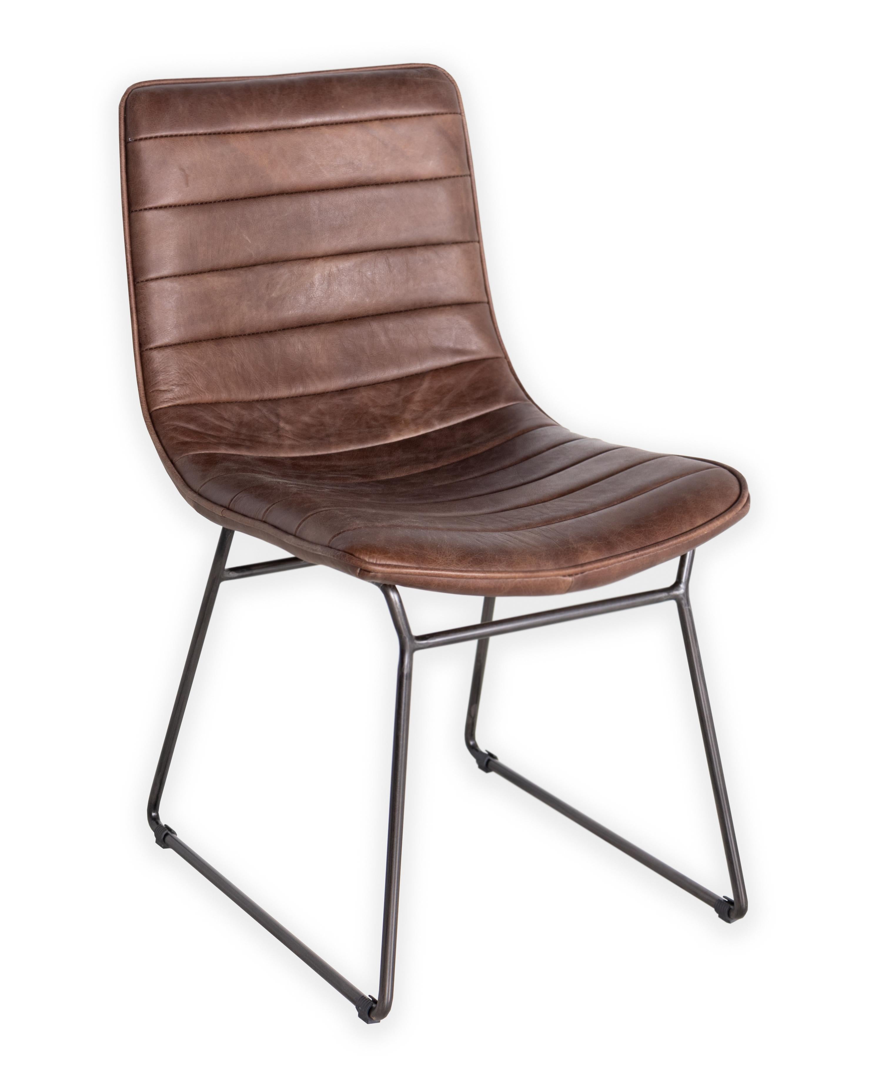 Bonded leather and steel modern dining chair. 

This piece is a part of Brendan Bass’s one-of-a-kind collection, Le Monde. French for “The World”, the Le Monde collection is made up of rare and hard to find pieces curated by Brendan from estate