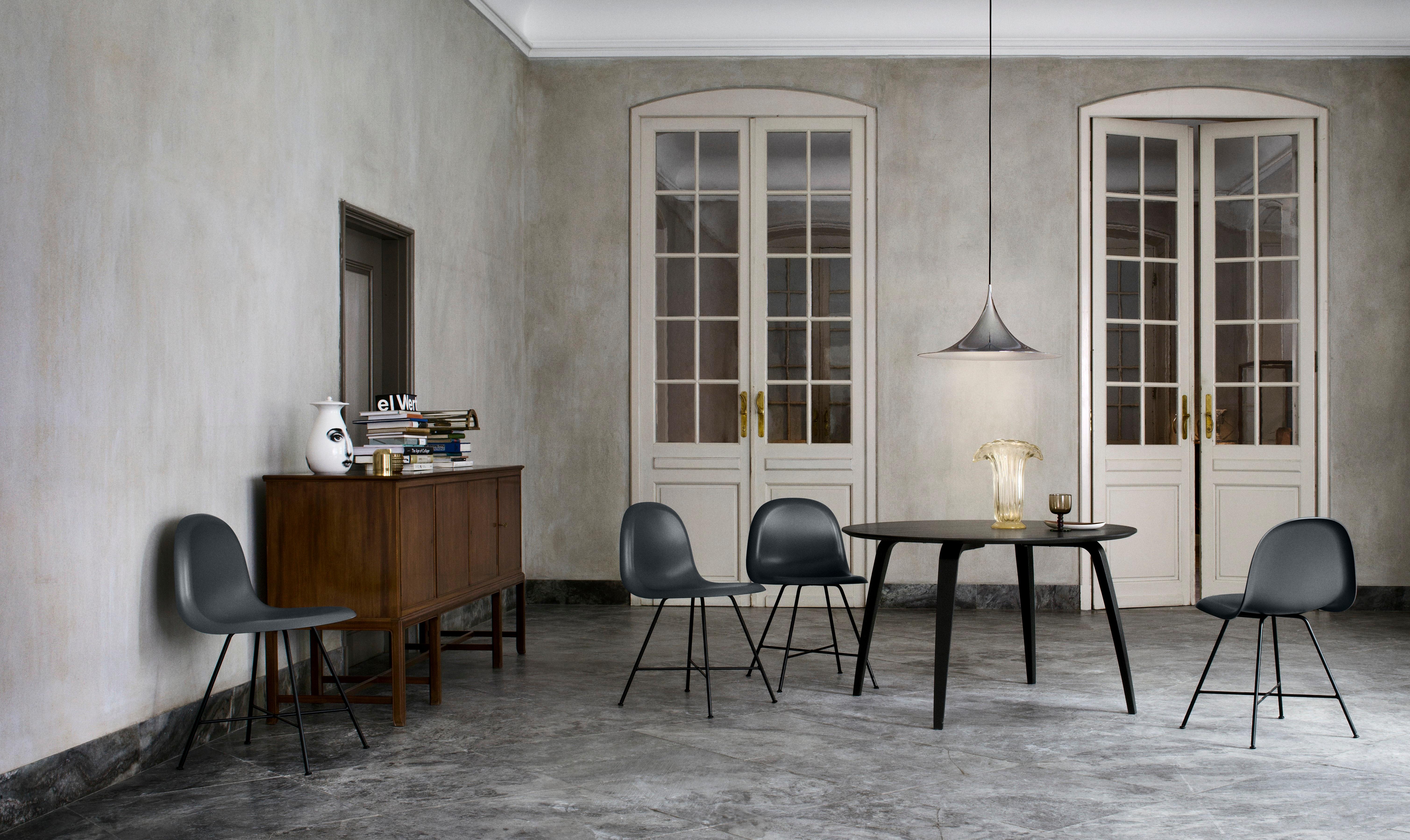 Bonderup And Thorup 'Semi' Pendant in Anthracite Gray.

Designed in 1968 by Claus Bonderup and Torsten Thorup, this authorized re-edition by GUBI of Denmark meticulously reproduces their work with great attention to detail and materials faithful