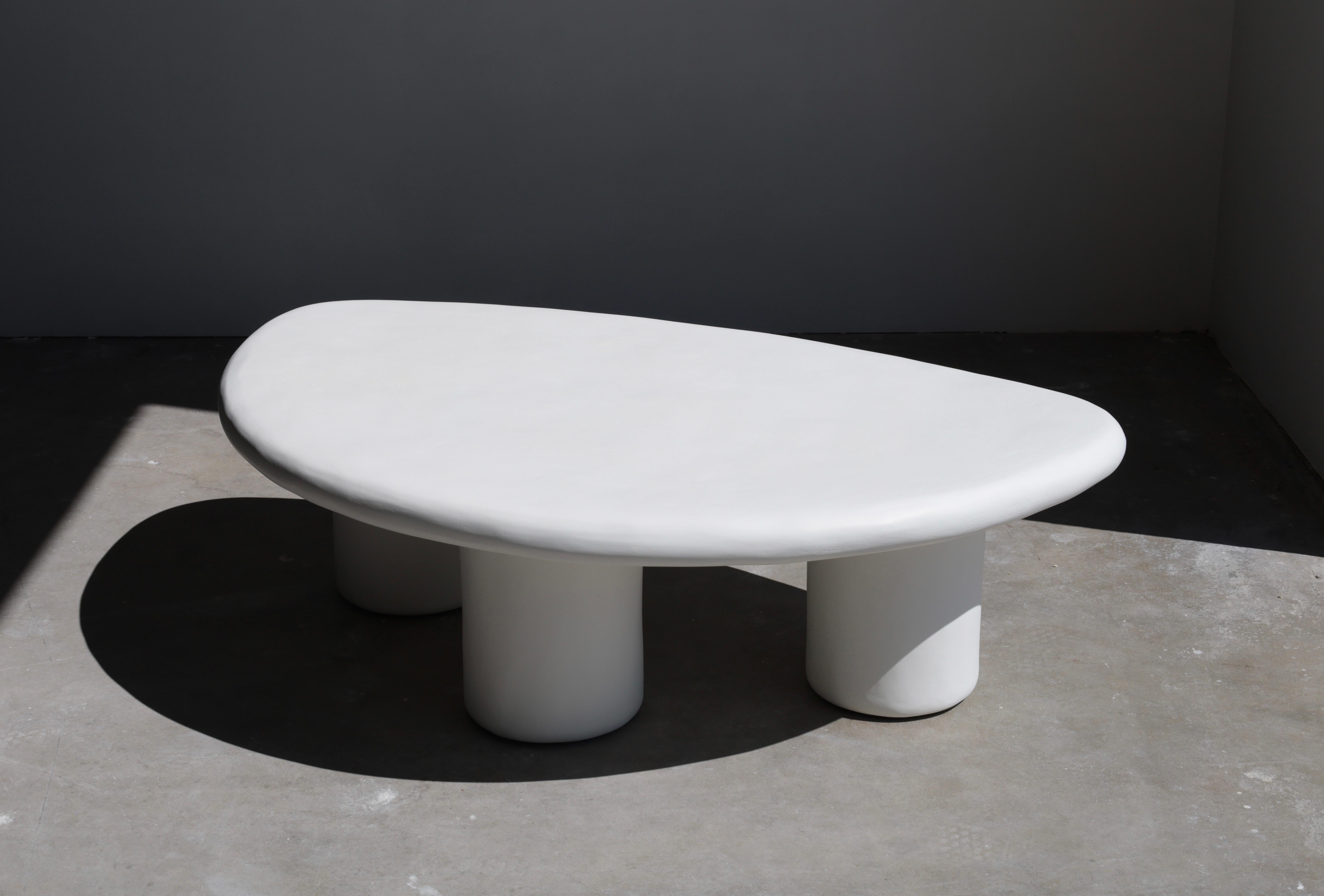 a very unique shape & playful design make this three-legged coffee table a perfect centerpiece to your living space

each öken house studio piece is handmade & made to order by a small team of plaster artisans and we try to utilize local vendors