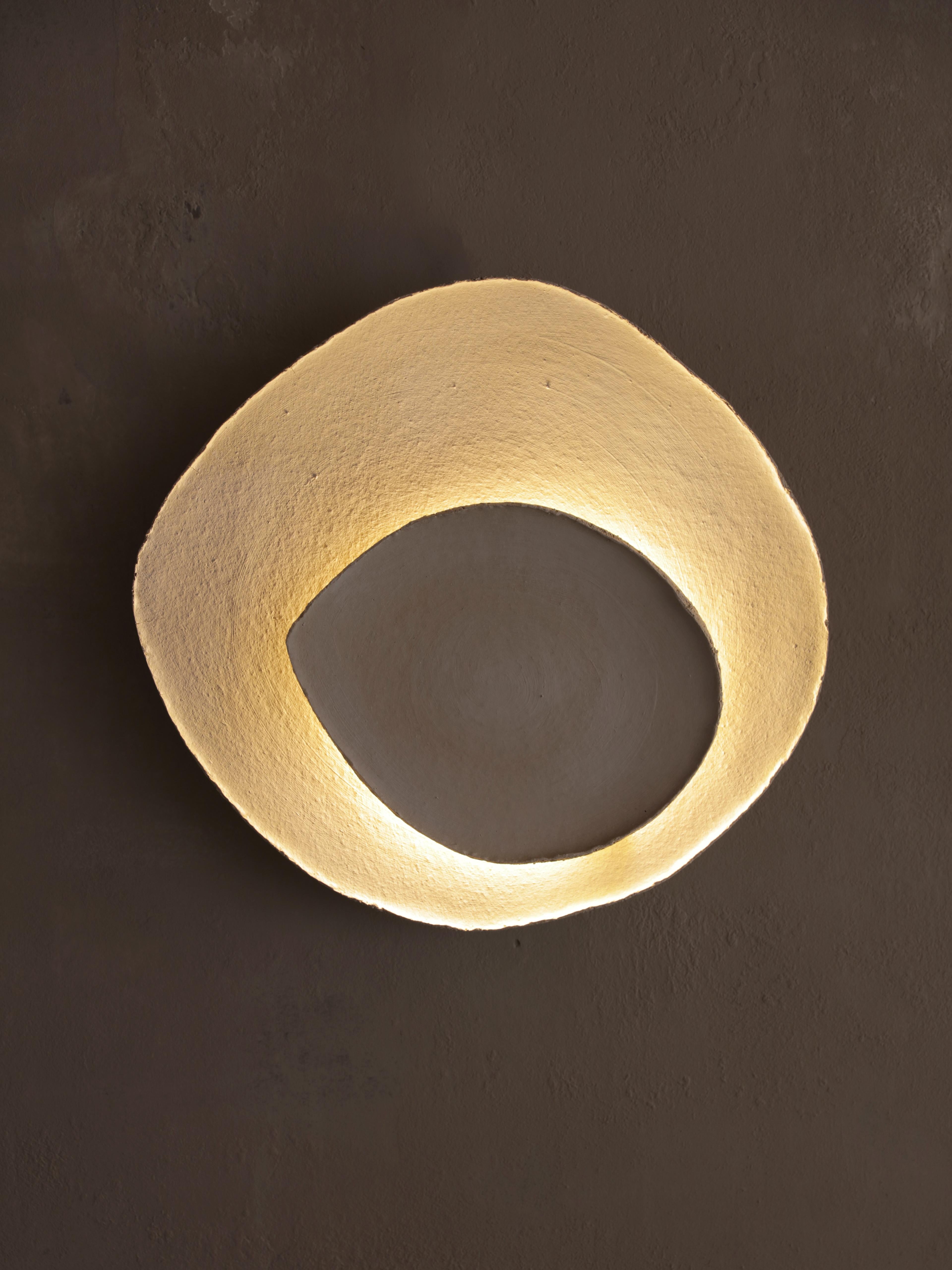 Bone #7 wall light by Margaux Leycuras
One of a Kind, Signed and numbered
Dimensions: D 6 x W 45 x H 42 cm 
Material: Ceramic, sand stoneware tops with a porcelain engobe finish.
The piece is signed, numbered and delivered with a certificate of