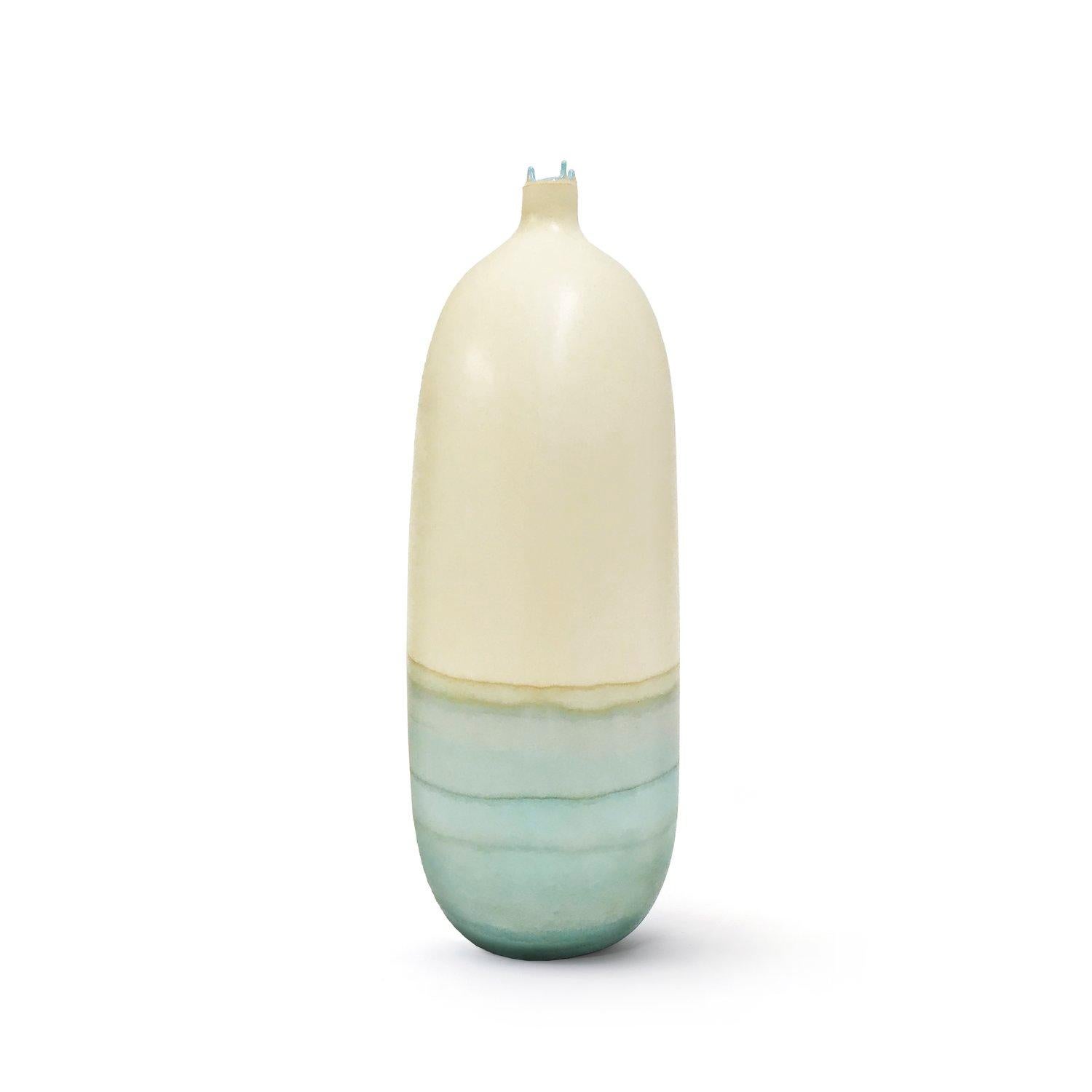 Bone and ice blue venus vase by Elyse Graham
Dimensions: W 14 x D 14 x H 38 cm
Materials: Plaster, Resin
Molded, dyed, and finished by hand in LA. Customization
Available.
All pieces are made to order

This collection of vessels is inspired