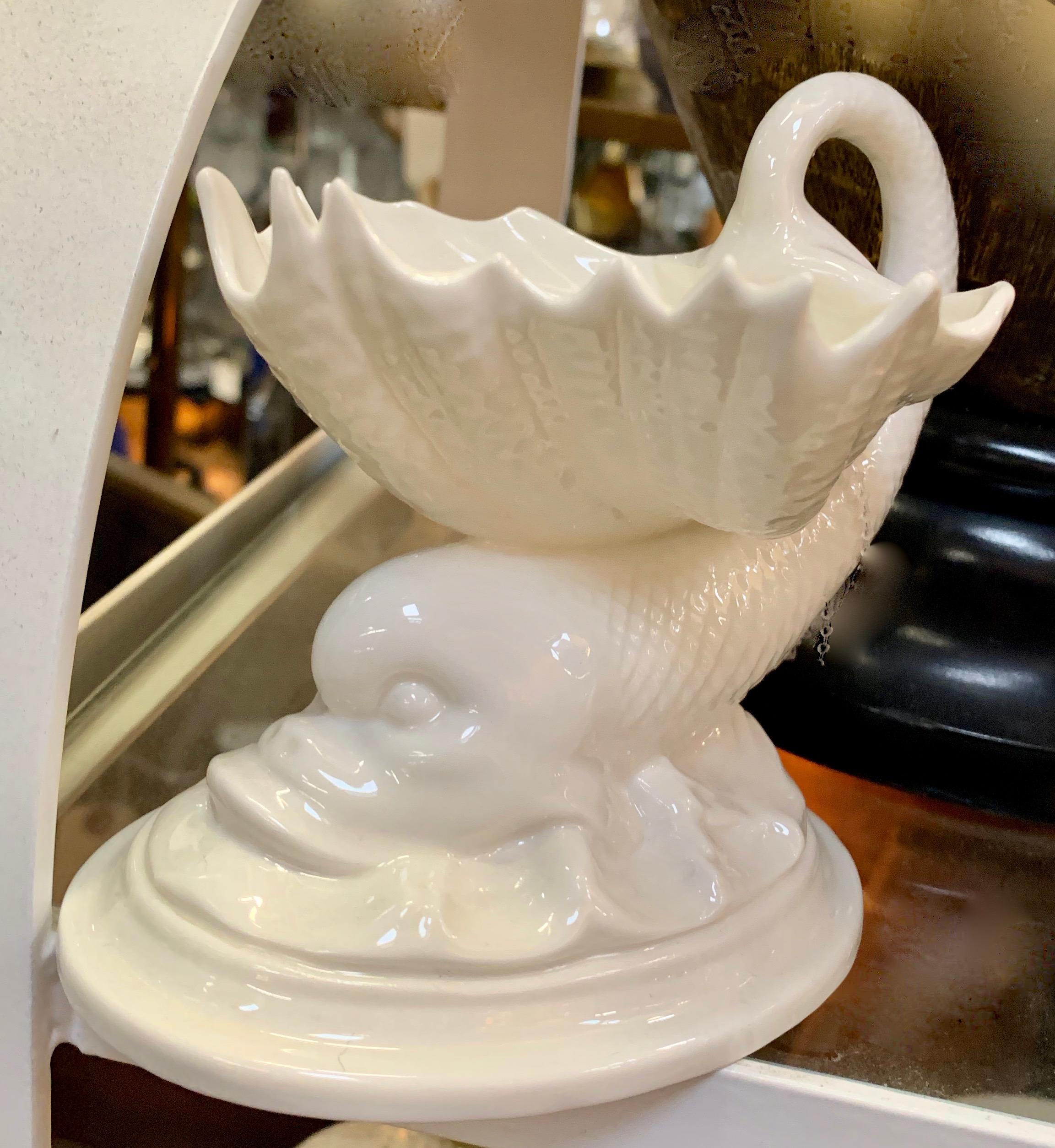 A wonderful bone China soap dish, a compliment to many bathrooms or kitchen sinks, could also be a candy dish.