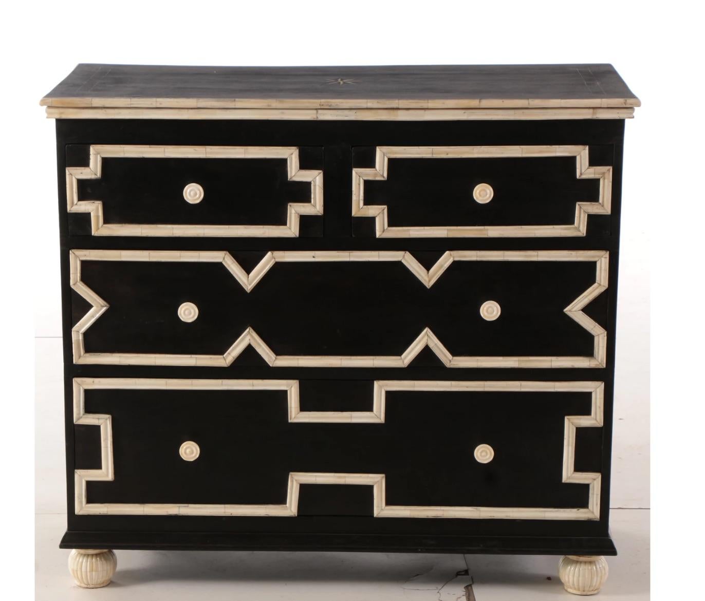 A stunning design statement for an extraordinary stylish space!

This is an extraordinary art deco style stylish unique black painted wood with stylish ivory color bone molding trim chest dresser in Fabulous Legendary Designer Dorothy Draper