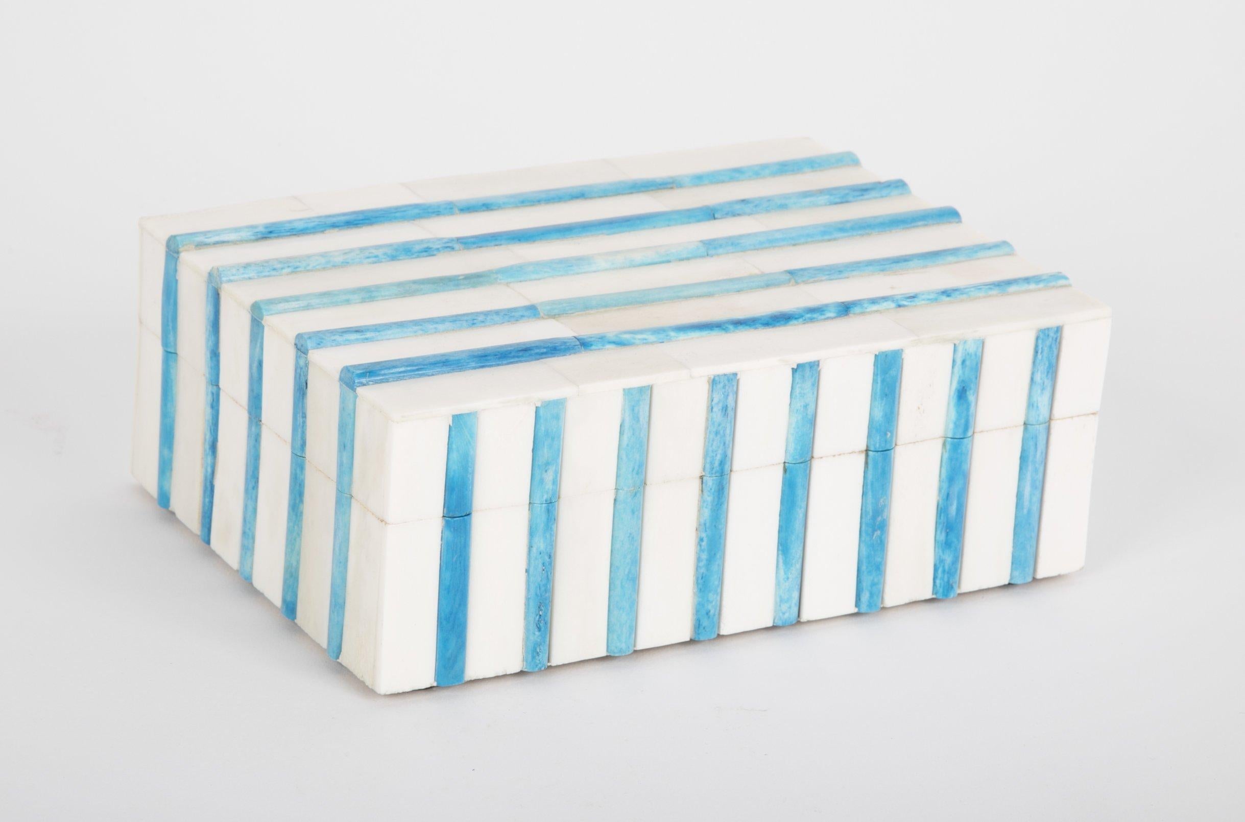 Natural mosaic bone box with raised Turquoise bone stripes, lined in wood.