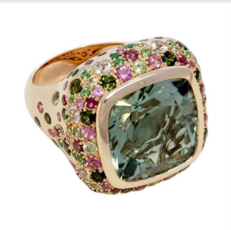 This one-of-a-kind ring is a true head-turner, featuring a wonderful cushion cut green amethyst, Green amethyst, officially called Prasiolite, radiates energy and balance. This colourful stone will sparkle in the sun and reflect the light as you