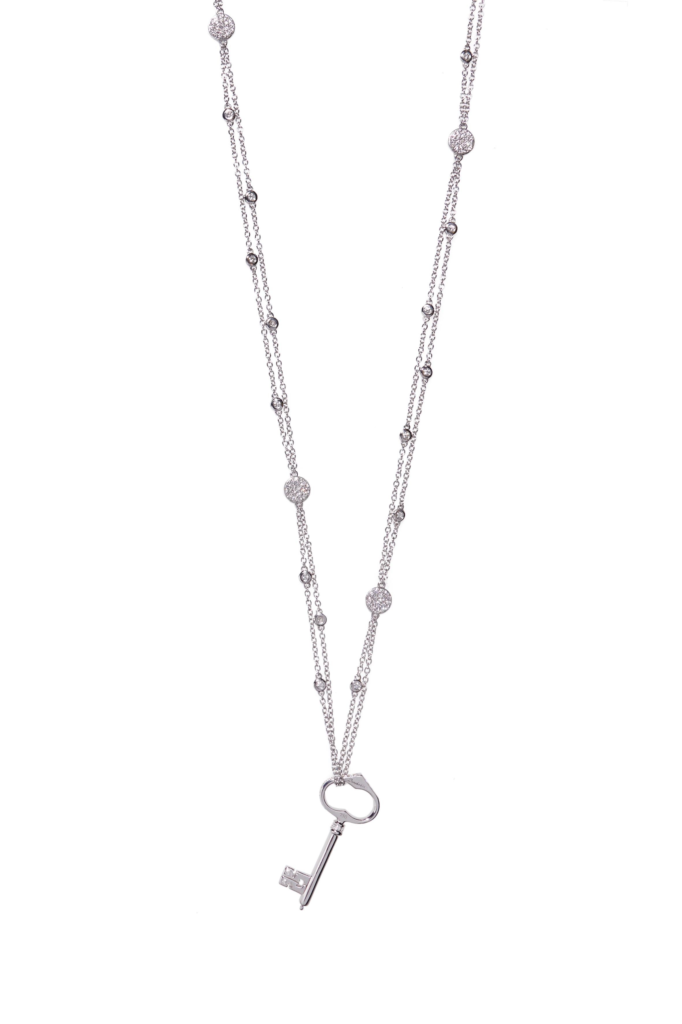 This 18 karat white gold necklace measures 79.5 cm (31.3 inch) which makes it perfect to wear as a sautoir or long necklace on its own as well as a sparkling base for a pendant, like our signature Key of Amsterdam.

Two chains are bezel set with