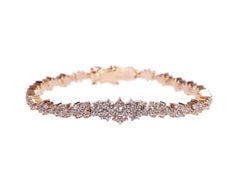 Bracciale in oro rosa con diamanti bianchi e champagne
