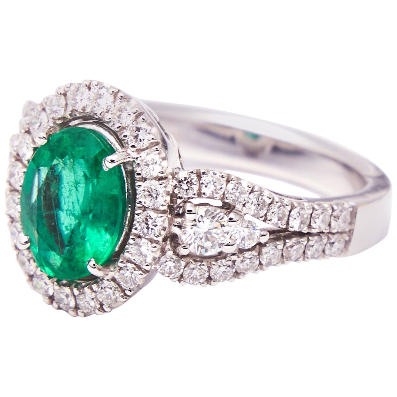 White Gold Engagement Ring with 1.50 Carat Oval Emerald and Diamonds