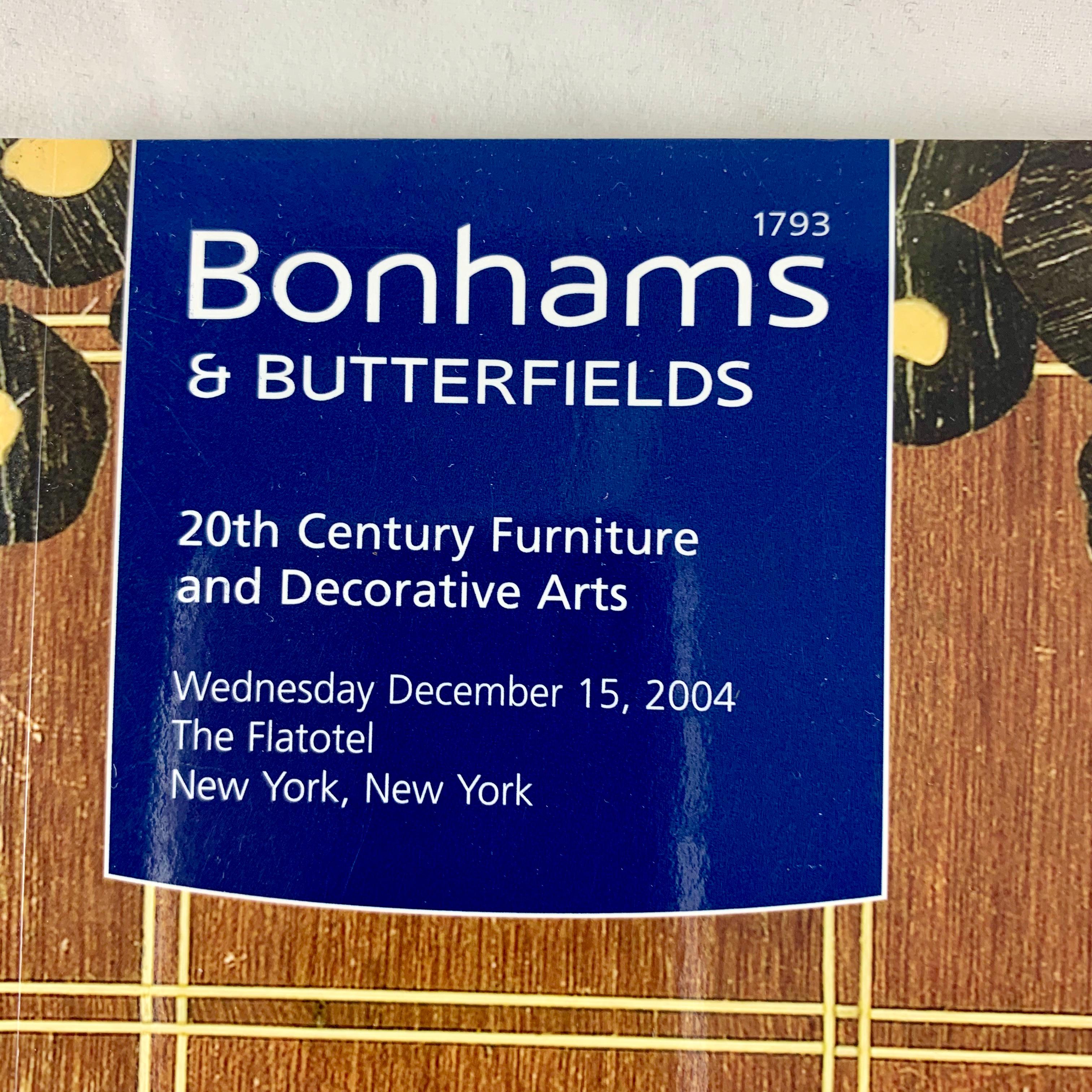 Catalogue de la vente Bonhams & Butterfield New York de mobilier et d'arts décoratifs du 20e siècle.

La vente présentait une magnifique collection de mobilier et de design Art déco ainsi qu'une collection de pièces modernistes, notamment de verre