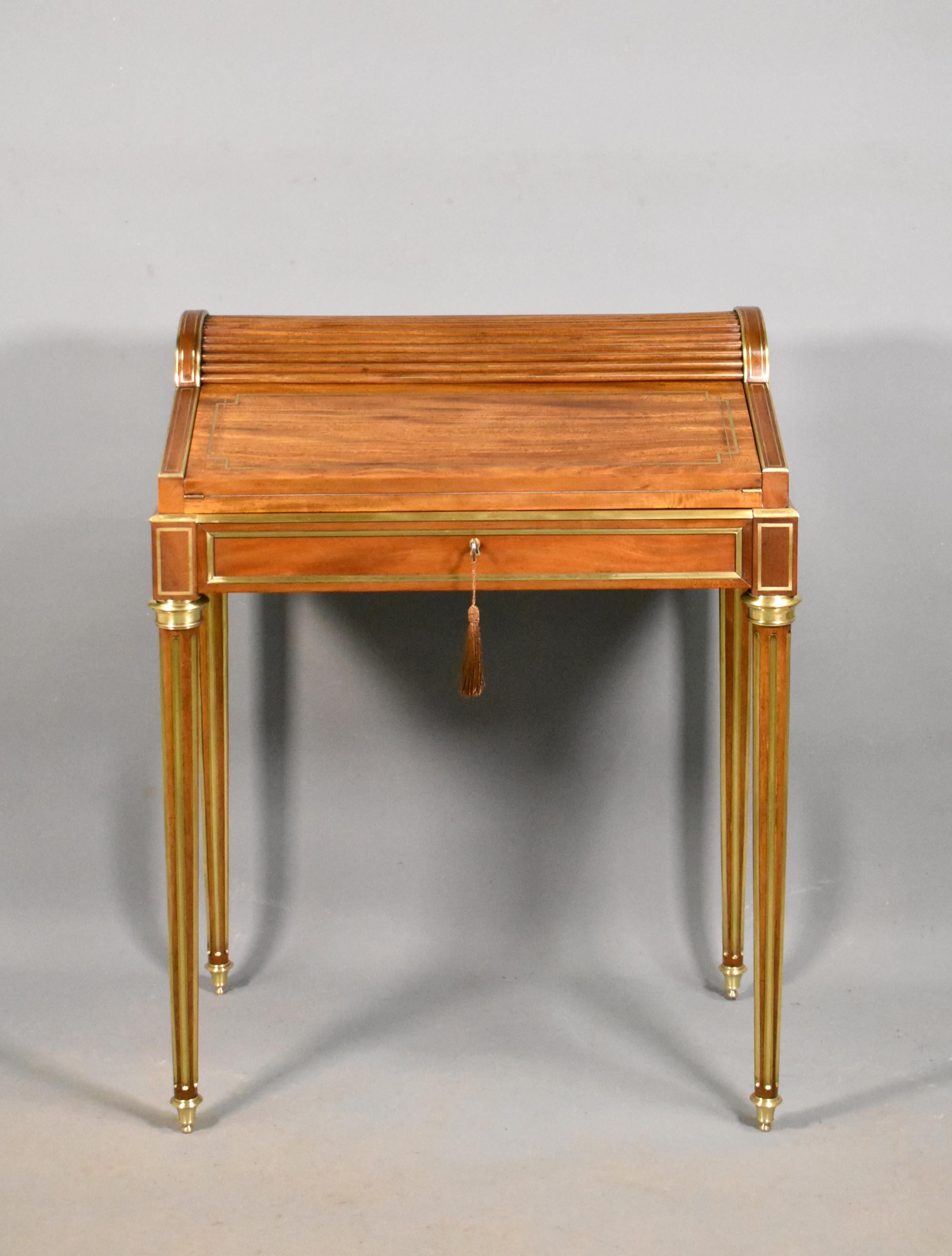 Bonheur Du Jour cylinder desk Louis XVI Style 

This beautifully crafted Bonheur Du Jour Cylinder desk in mahogany is in the style of Paul Sormani, a renowned cabinet-maker, who operated in Paris between 1817-1866. His work was highly recognised