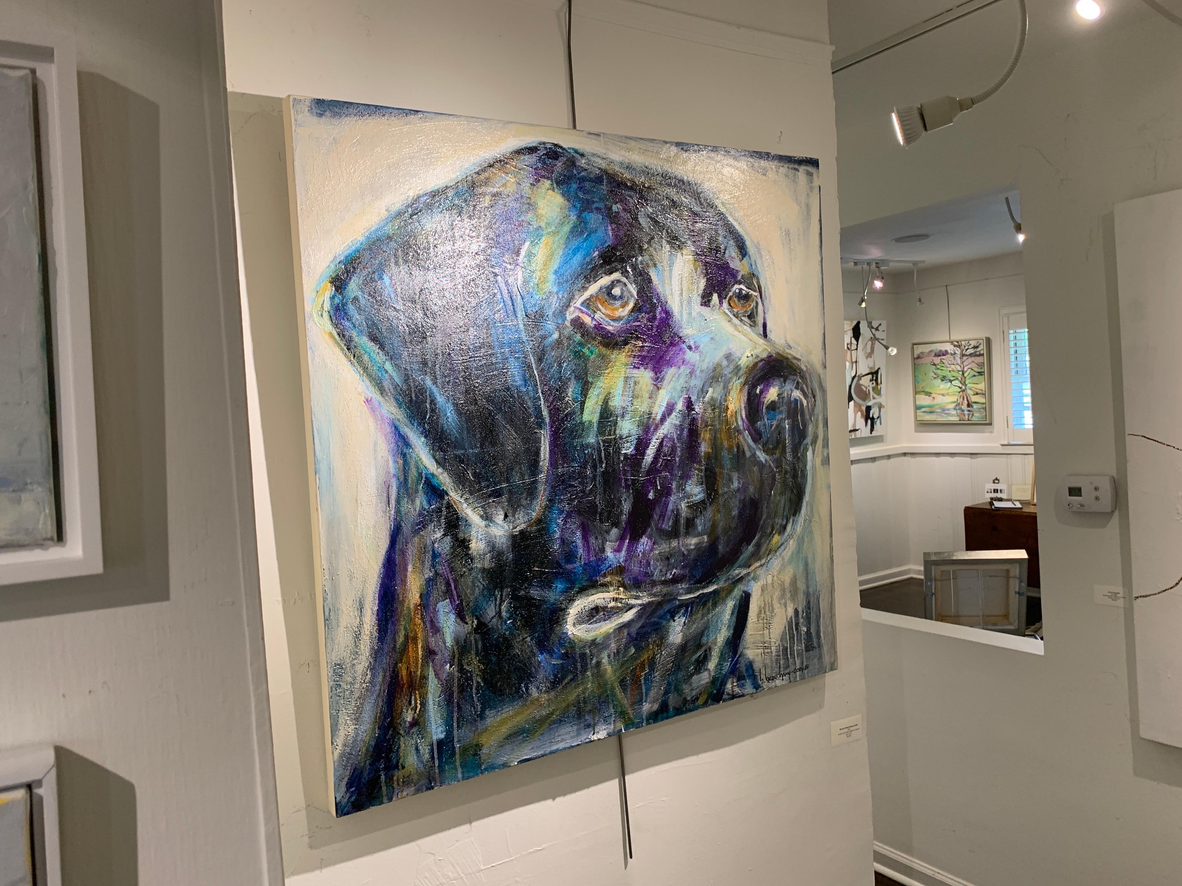 This mixed media on canvas animal painting by American artist and cowgirl Bonnie Beauchamp Cooke is entitled 'Ace and was created in 2021. The painting depicts a Retriever portrait from the side. The subject is so close to us, that we feel like we