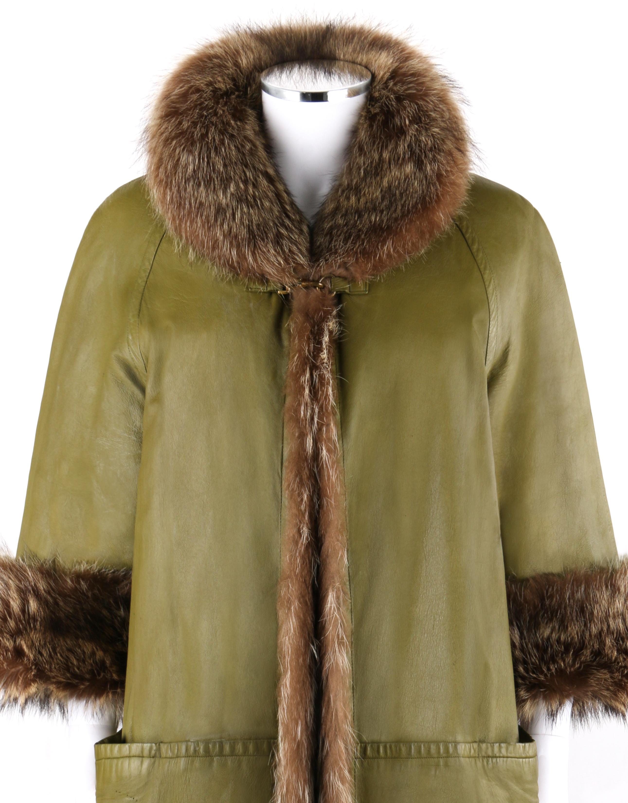 BONNIE CASHIN c.1960’s SILLS & Co. Olive Green Raccoon Fur Leather Mod Overcoat 
 
Circa: 1960’s
Designer: Bonnie Cashin 
Label(s): Bonnie Cashin Design / Sills and Co. 
Style: Coat
Color(s): Shades of green and brown
Lined: Yes 
Unmarked Fabric