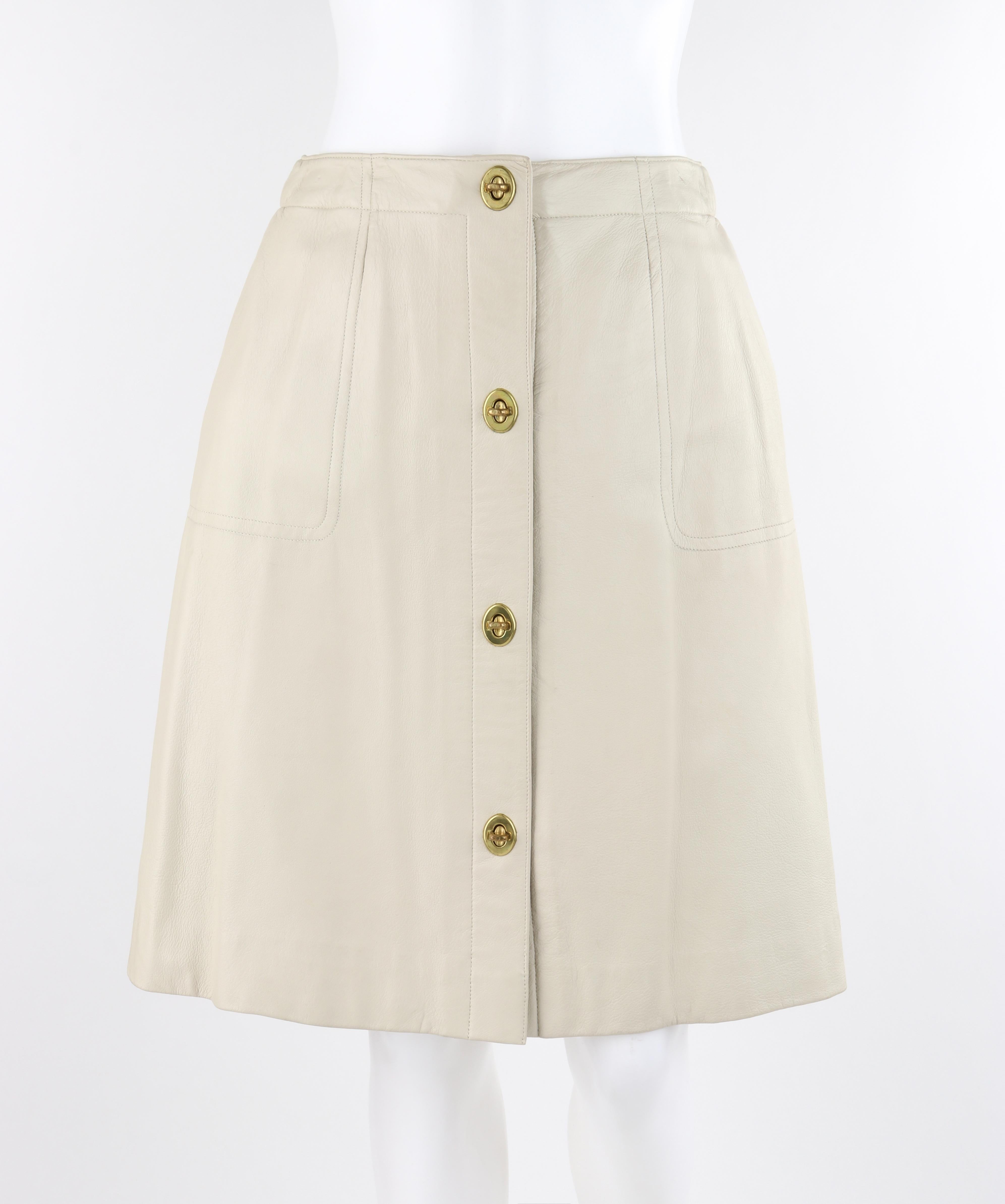 Women's BONNIE CASHIN c.1970’s Sills Off-White Leather Gold Twist Lock Jacket Skirt Set For Sale