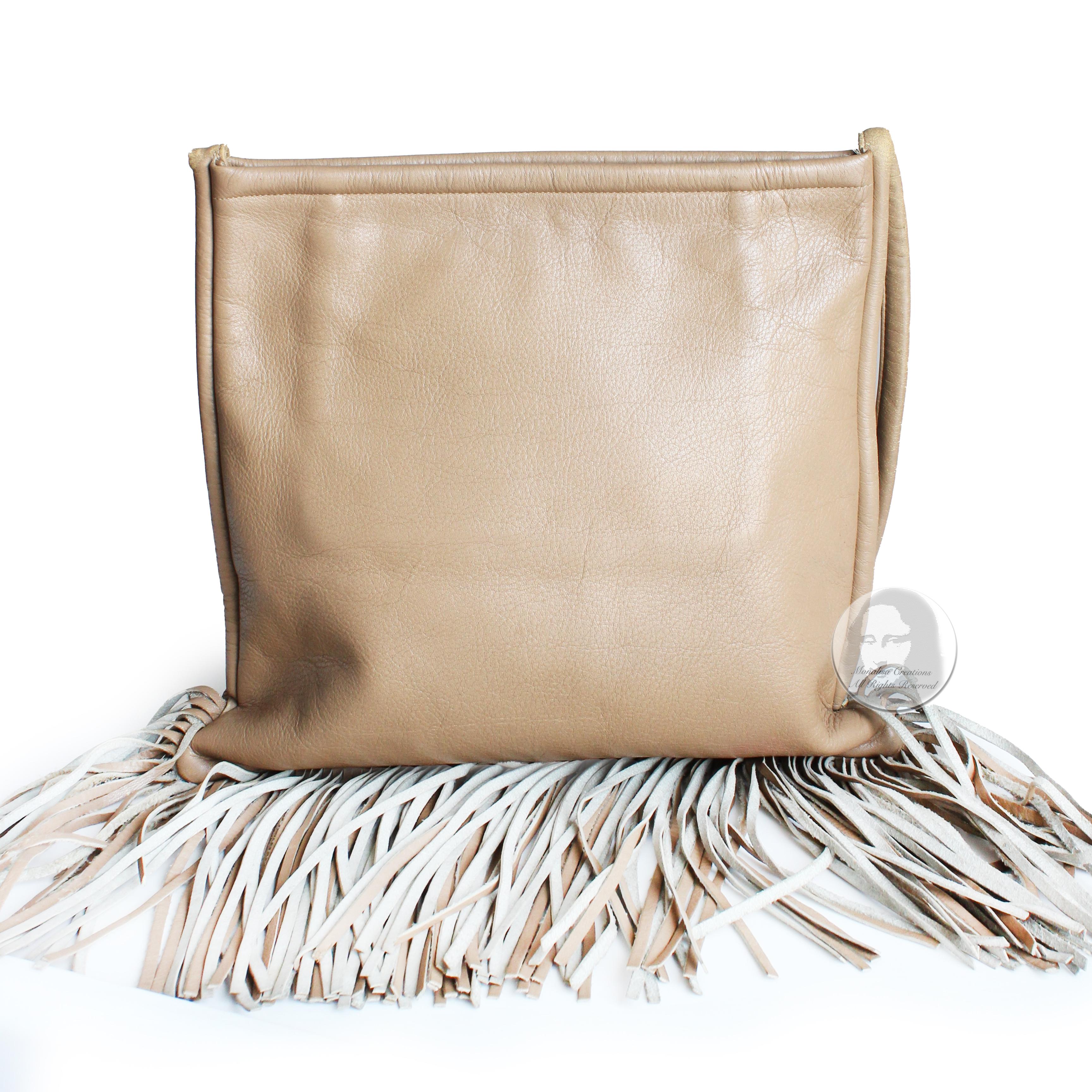 Authentic, preowned, vintage Bonnie Cashin for Coach Cashin Carry Leather Fringe Shoulder Bag, likely made in the 60s. A 