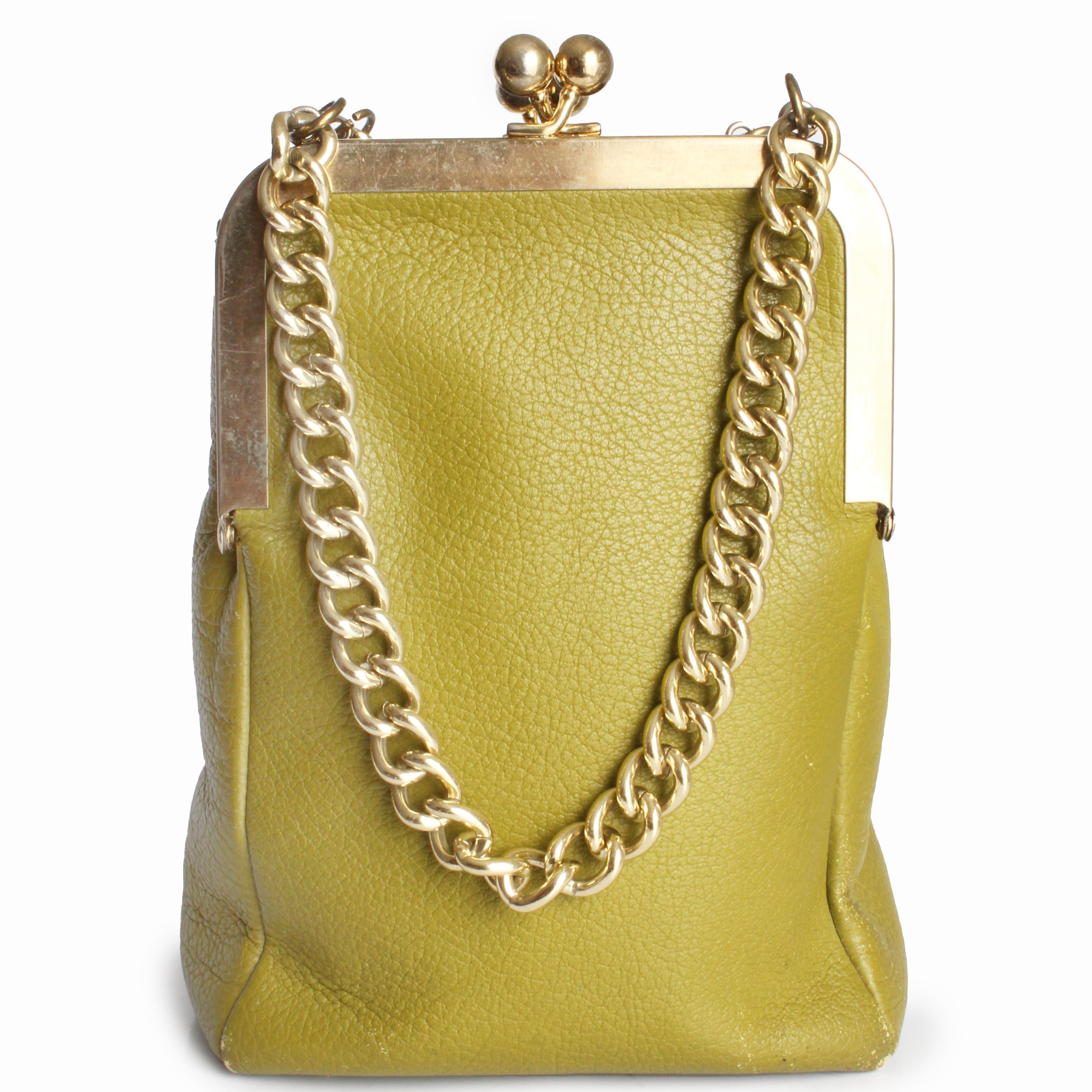 Preowned, vintage Bonnie Cashin for Coach Small Double Header tote bag with chain straps, likely made in the mid 1960s. Made from textured lime green or Mimosa leather, this fabulous bag features a deep kiss lock pocket on each side and an open main