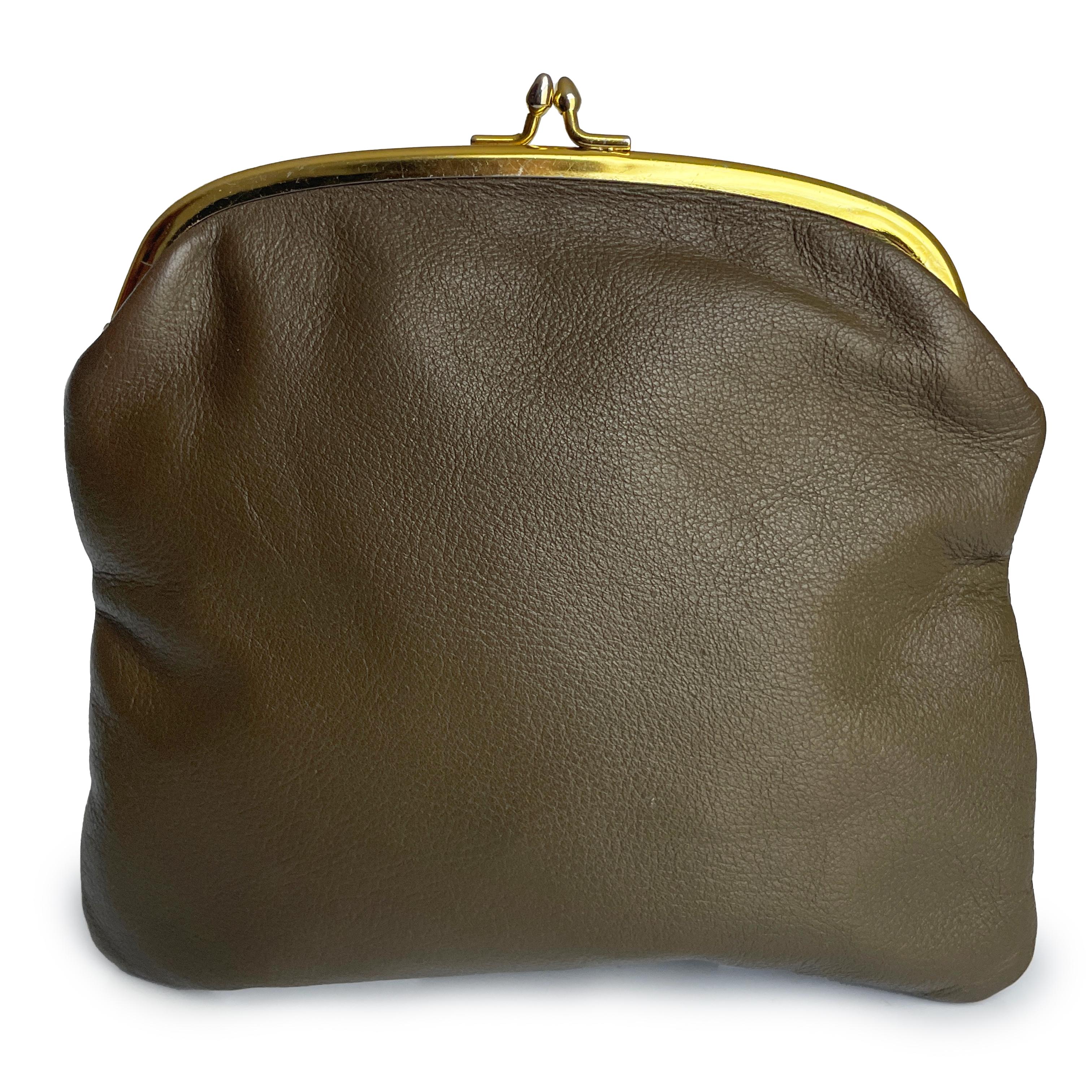 Bonnie Cashin for Coach 'foldover purse' or clutch bag, part of Bonnie's Cashin Carry accessories collection and likely made in the late 1960s.  Made from a mocha-hued leather, this fabulous little bag fastens with a gold metal kiss lock and is