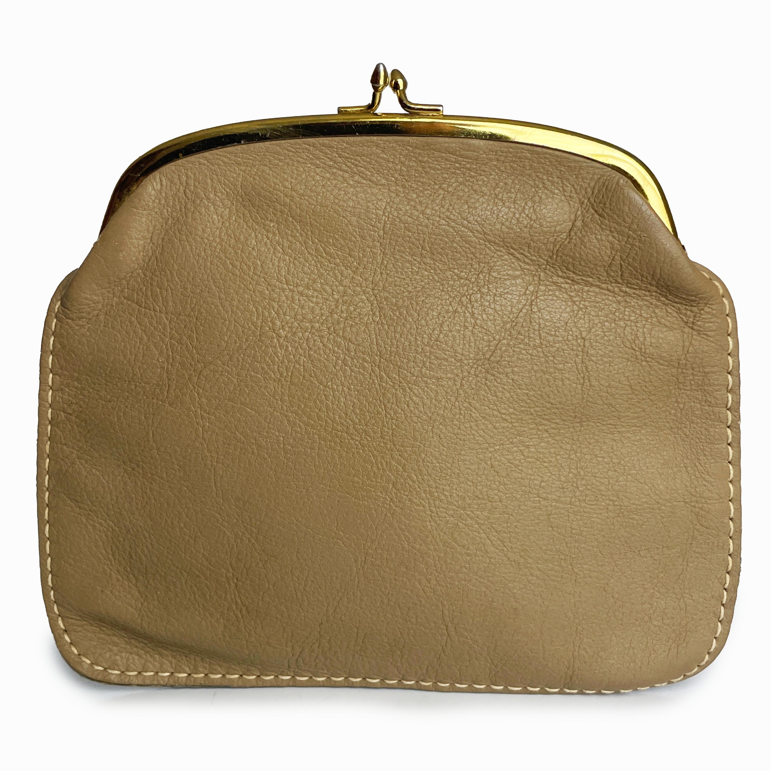 Bonnie Cashin for Coach 'foldover purse' or clutch bag, part of Bonnie's Cashin Carry accessories collection and likely made in the late 1960s.  Made from tan leather (which we believe was originally called 