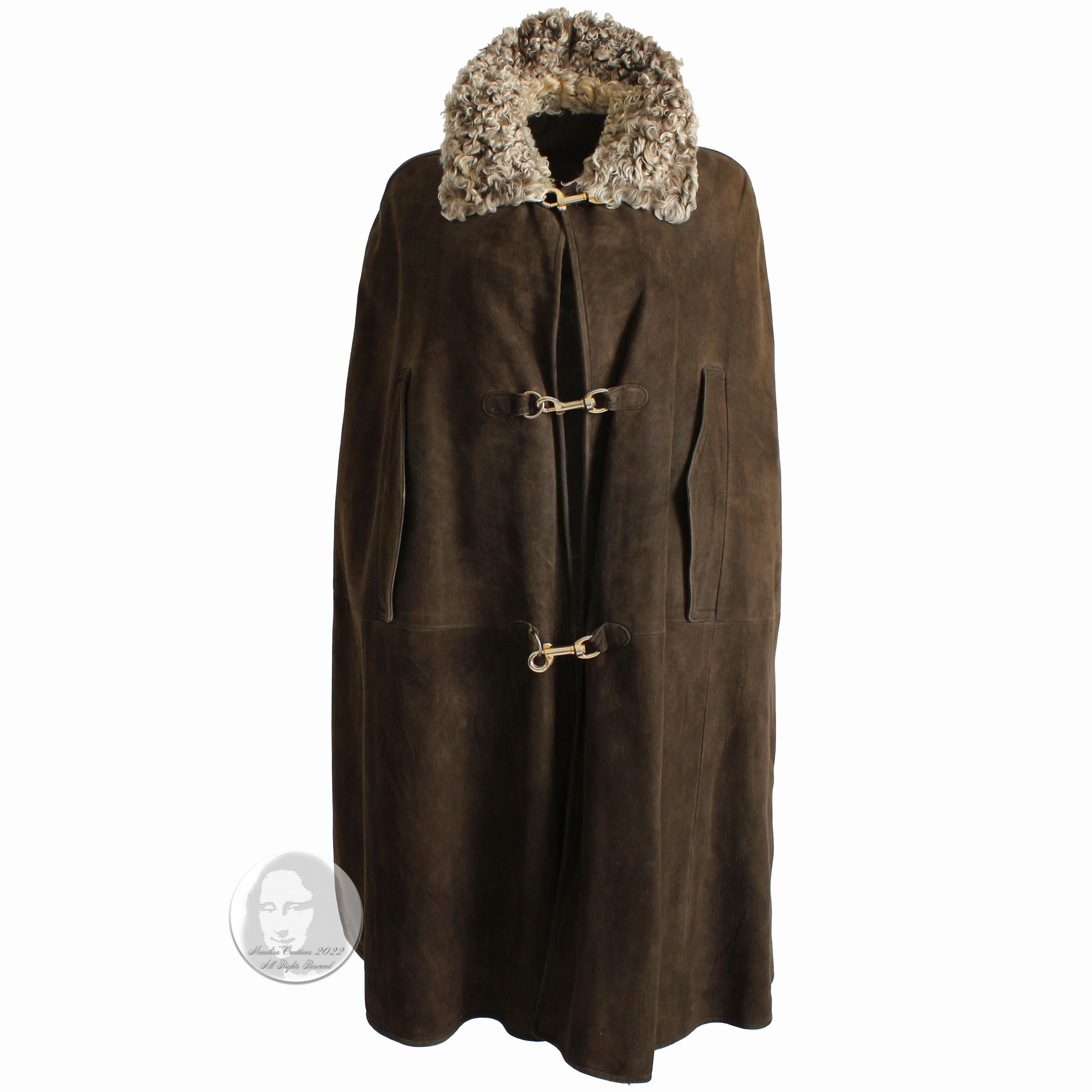 This incredible long cape was designed by Bonnie Cashin, likely in the early 1970s. Made from a substantial brown suede leather, it's lined in matching brown wool jersey fabric.  It fastens with three brass dog leash fasteners, a signature hallmark