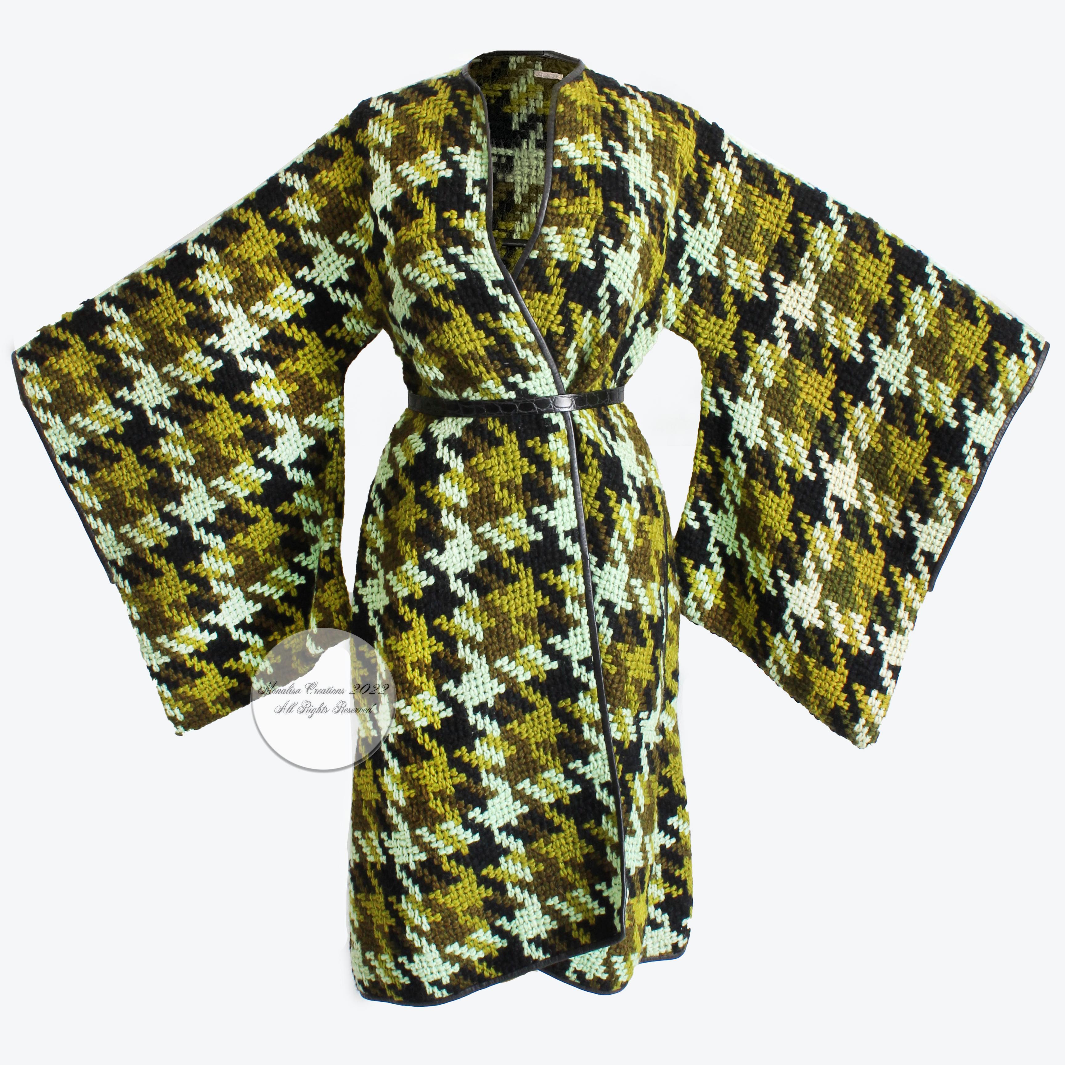 Incredibly rare and uniquely gorgeous vintage Bonnie Cashin for Sills coat with exaggerated trailing sleeves, likely made in the late 60s.  Made from a supple mohair and wool boucle knit, the oversized houndstooth pattern features several shades of