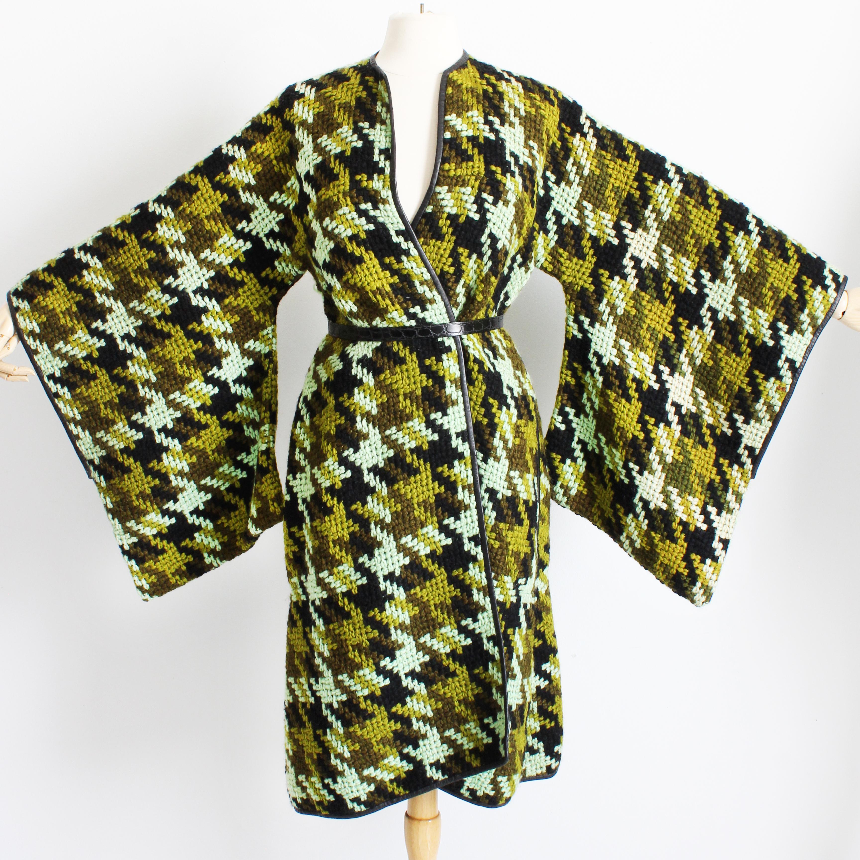 Incredibly rare and uniquely gorgeous vintage Bonnie Cashin for Sills coat with exaggerated trailing sleeves, likely made in the late 60s. Made from a supple mohair and wool basket weave knit, the oversized houndstooth pattern features several