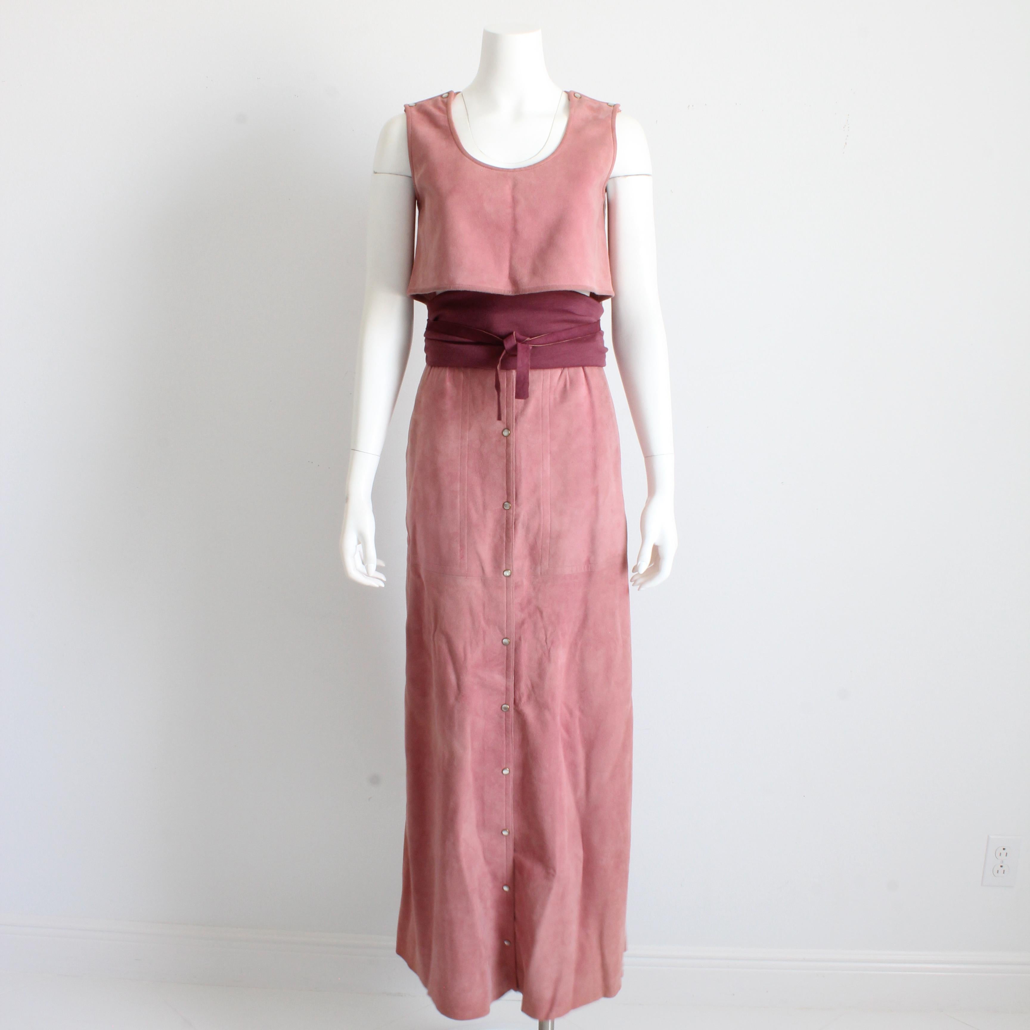 Vintage and rare Bonnie Cashin for Sills 3pc Skirt Set, likely made in the early 70s.  

Made from a pale pink chamois suede, the set includes a cropped tank, matching maxi skirt and a dark cranberry wool jersey Obi-style belt with leather wrap