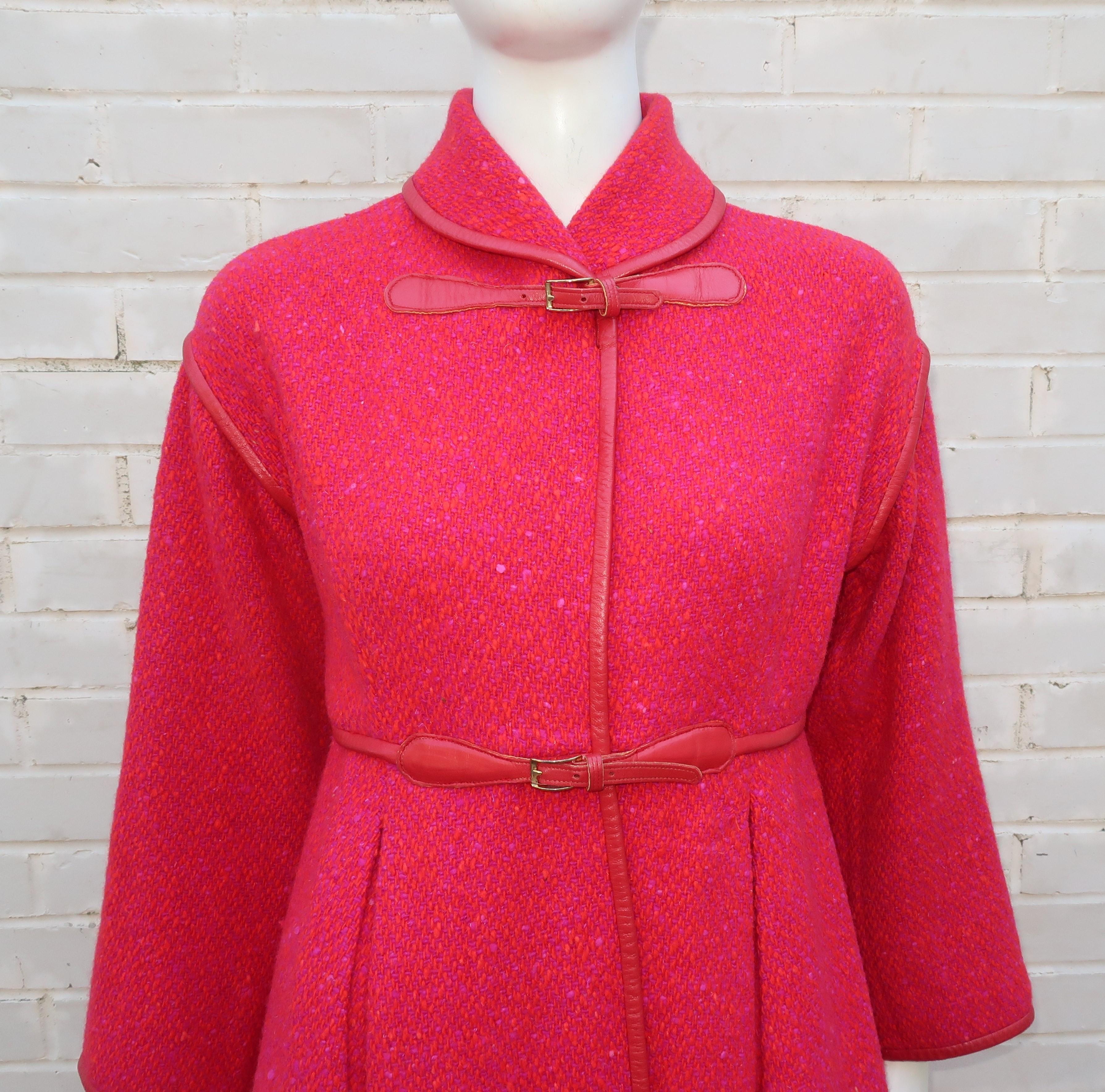 A fun 1960's wool tweed coat by one of the most influential and innovative American designers of the 20th century, Bonnie Cashin.  Ms. Cashin's fondness for mixing fabrics and textures is at play in this design with a nubby tweed fabric mixing red